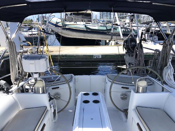 Cockpit view of 2001 Jeanneau 45.2 sailboat docked at marina.
