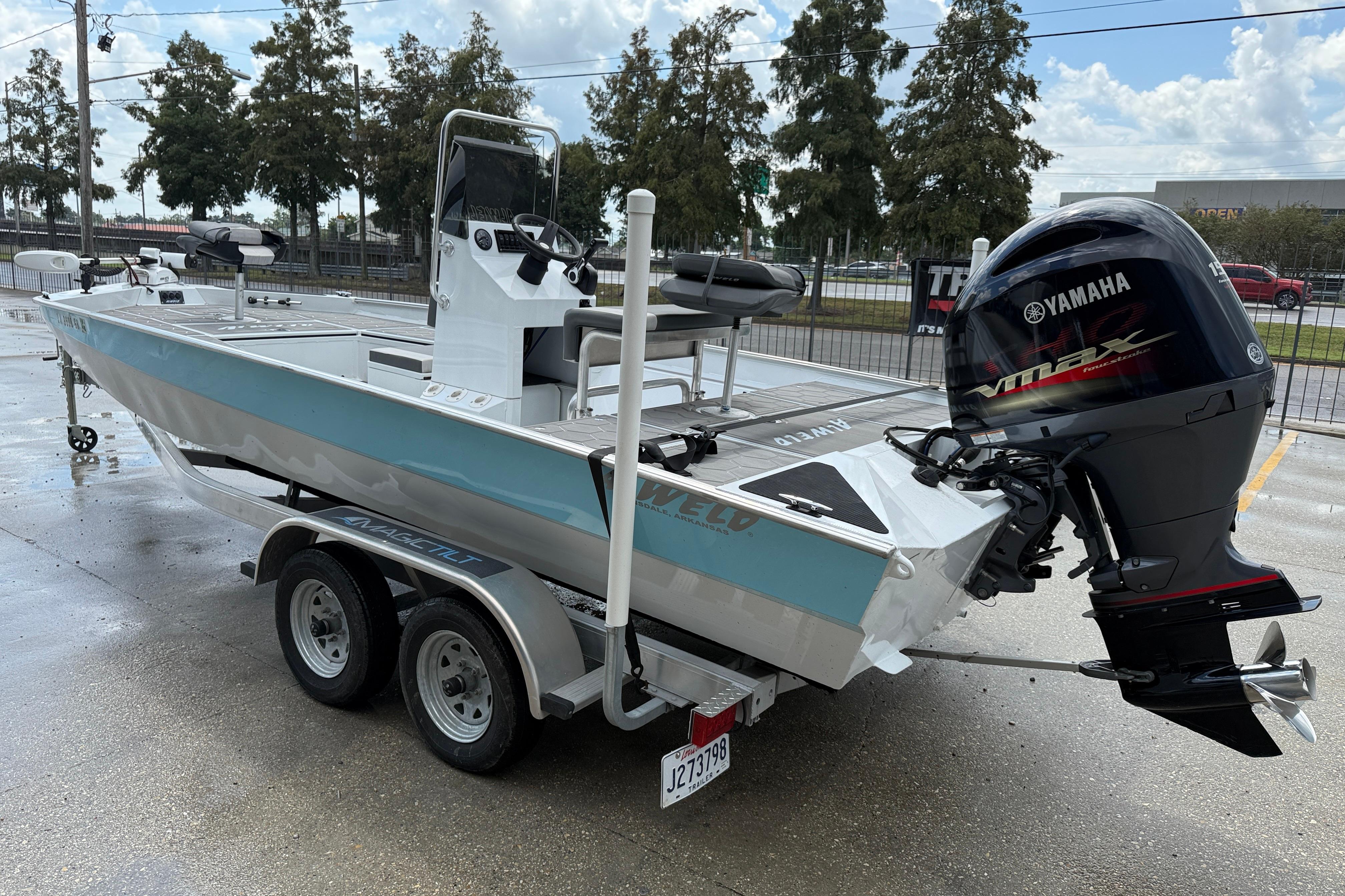 2024 Alweld 2070cc boat with Yamaha outboard motor on a trailer.