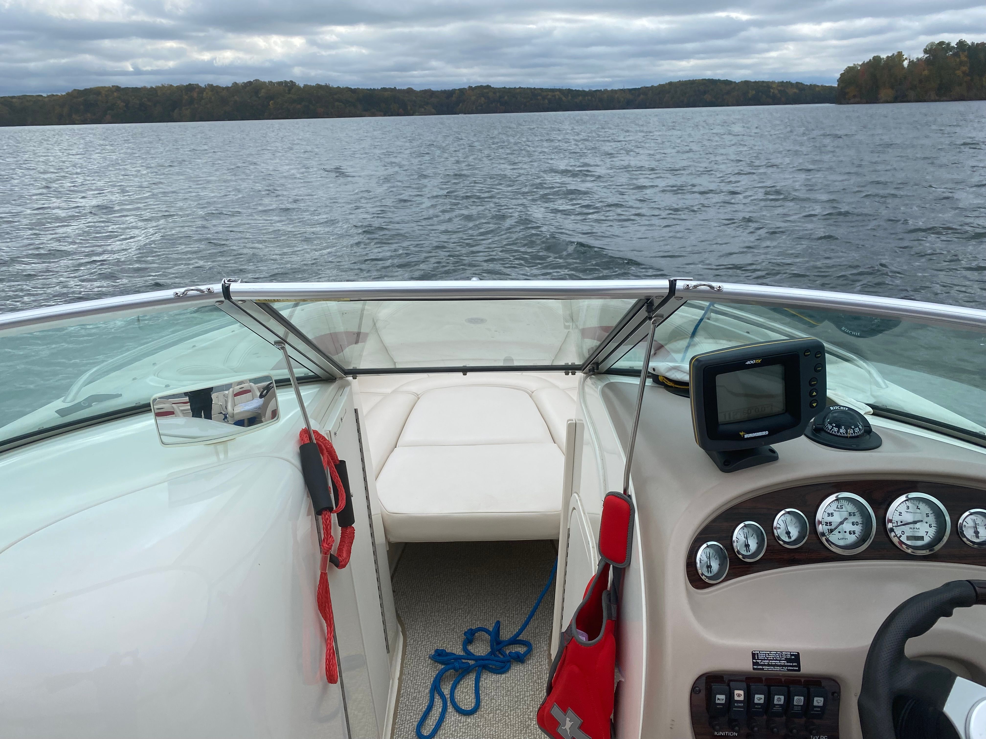 Chaparral 230 SSi boat on a calm lake, 2000 model.
