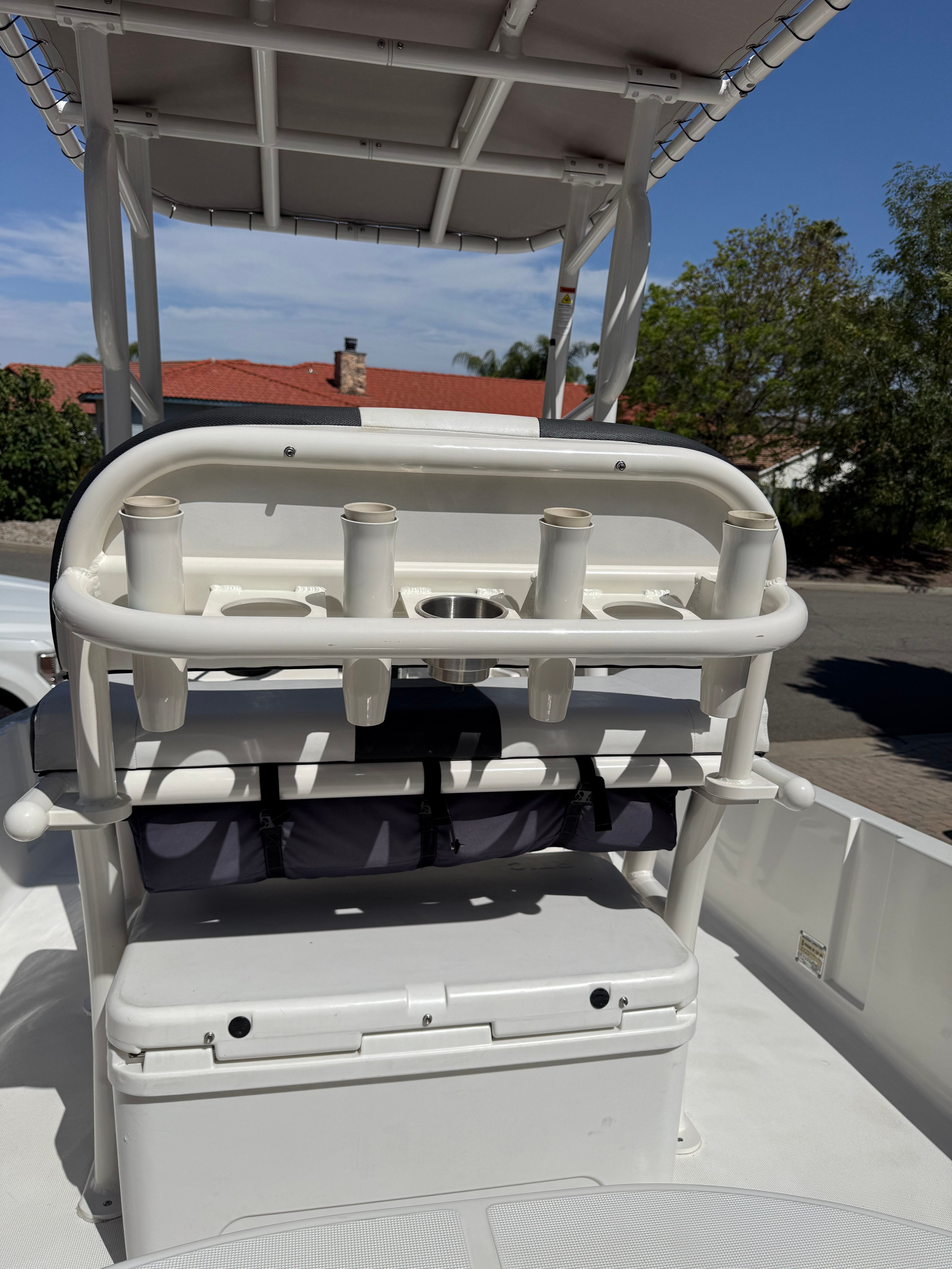 1998 Robalo 2100 Bay Hunter with rod holders and storage.