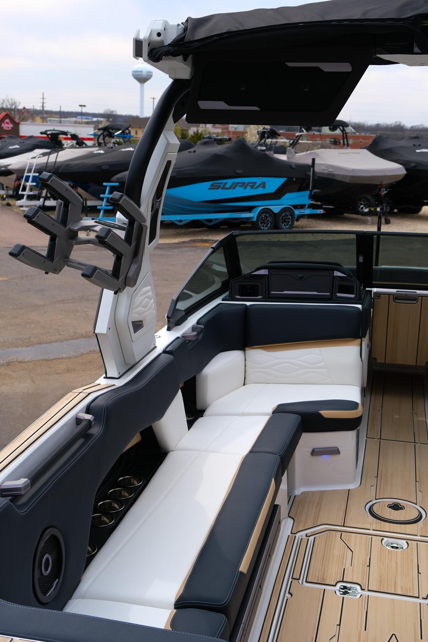 2025 Supra SE450 boat interior with sleek seating and modern design elements.