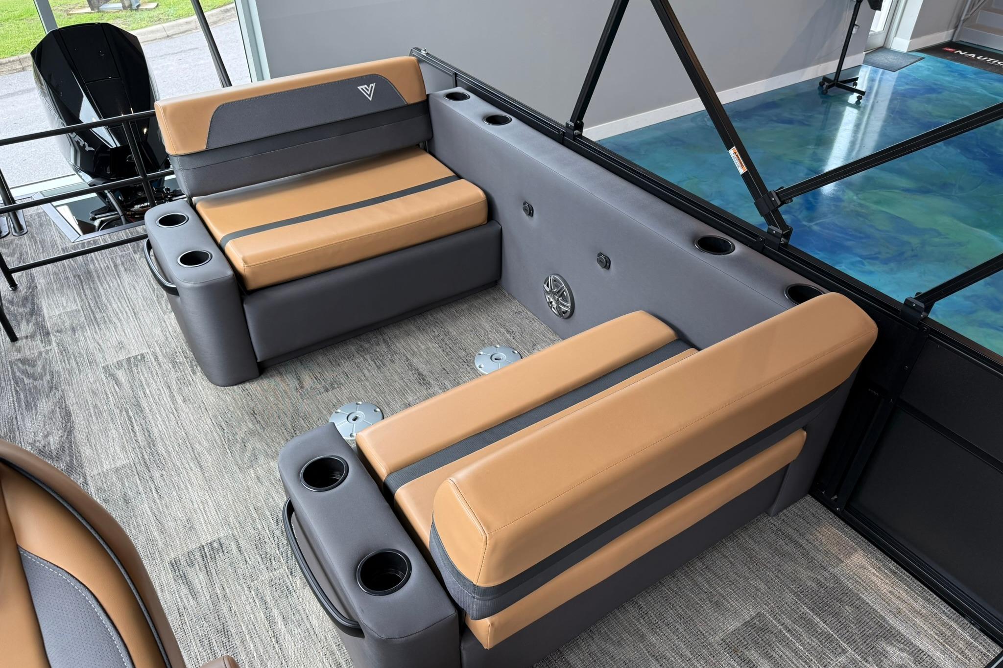 Interior of 2025 Viaggio Lago X-D boat with tan and gray seating.