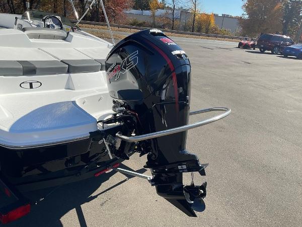 2025 Tahoe T18 boat with powerful outboard motor in a sunny outdoor setting.