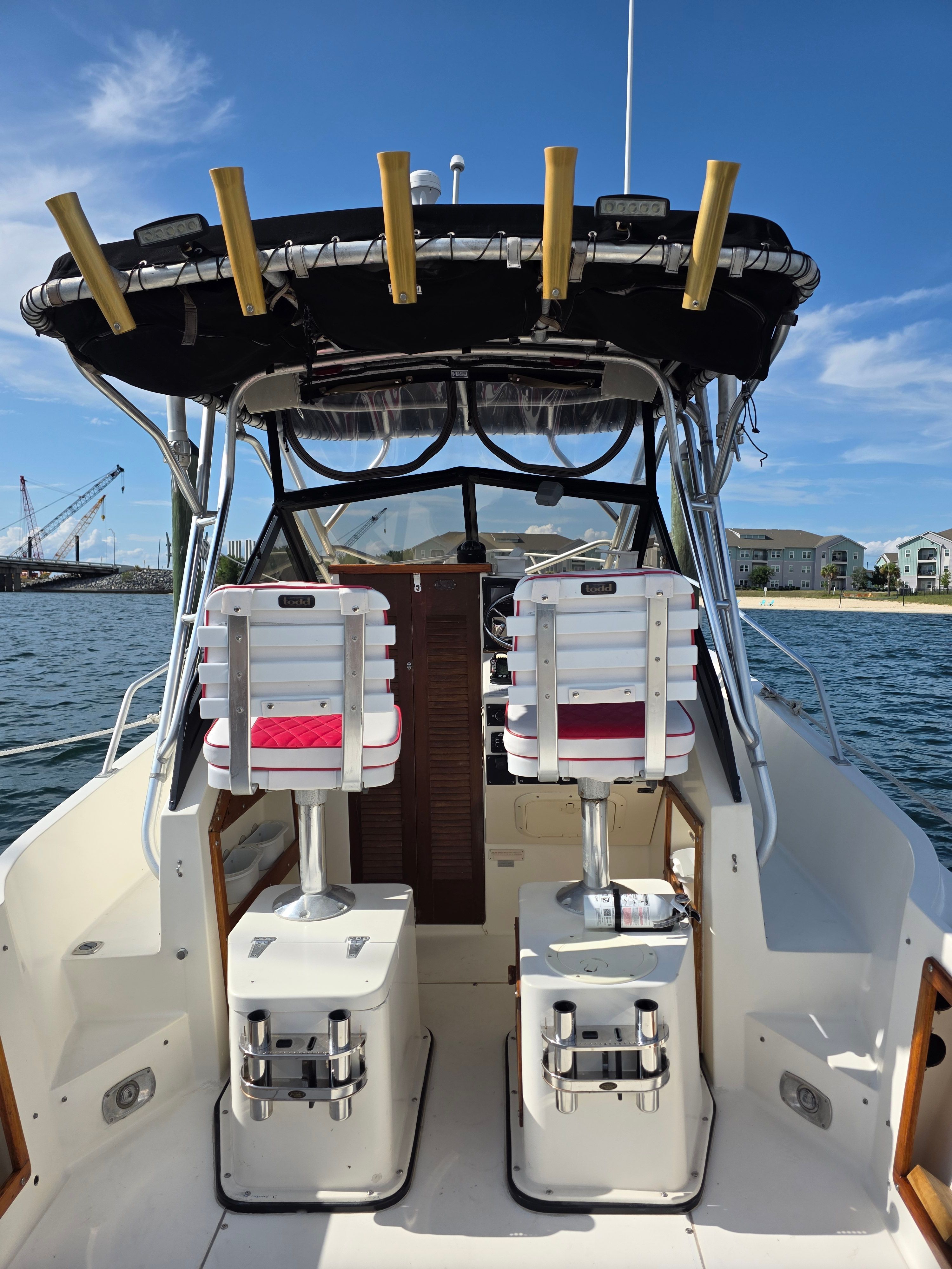 Interior view of a 1987 Mako 248 WAC boat on the water.