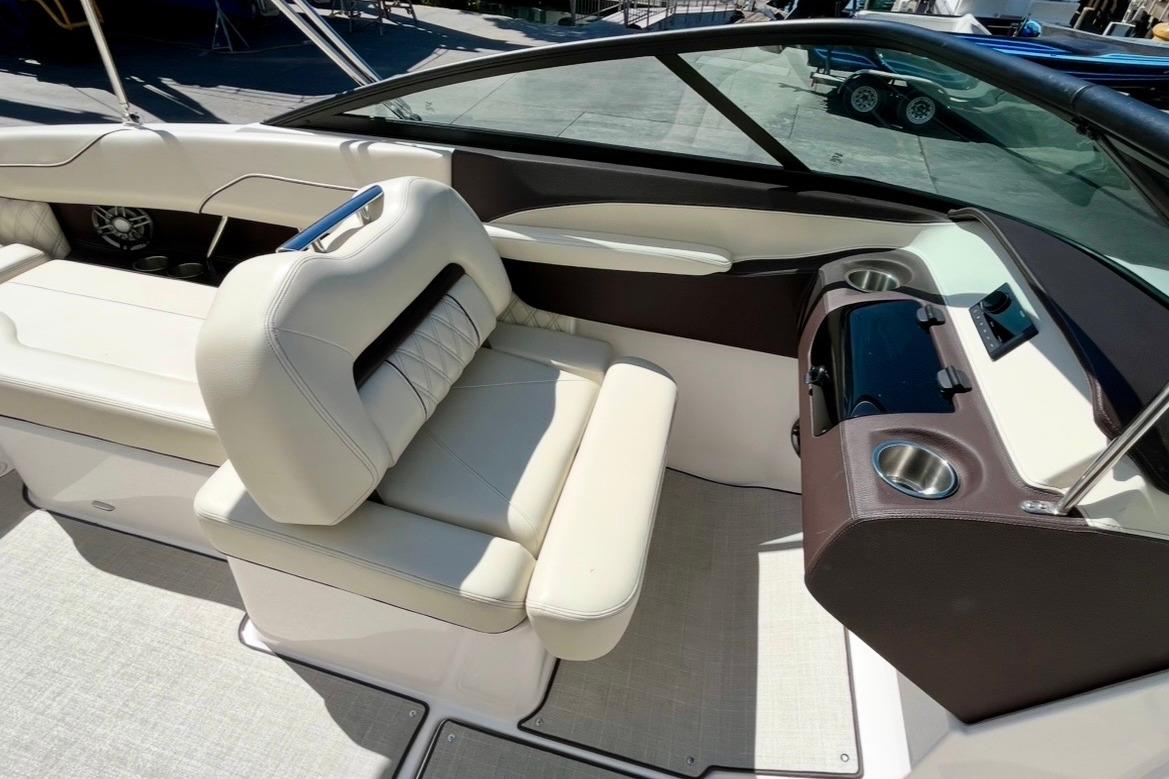 Luxurious interior of 2025 Regal LX2 boat with plush seating and modern dashboard.