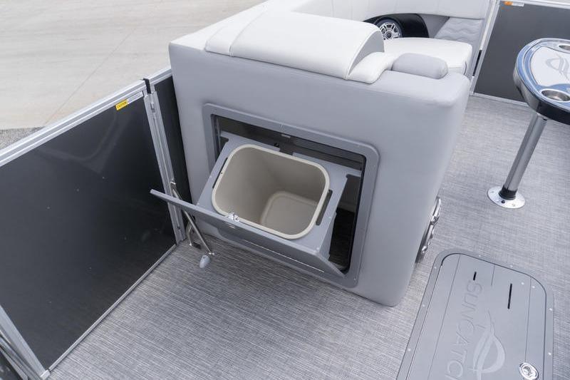 2026 SunCatcher Elite 326 SL boat interior with built-in storage compartment and seating.