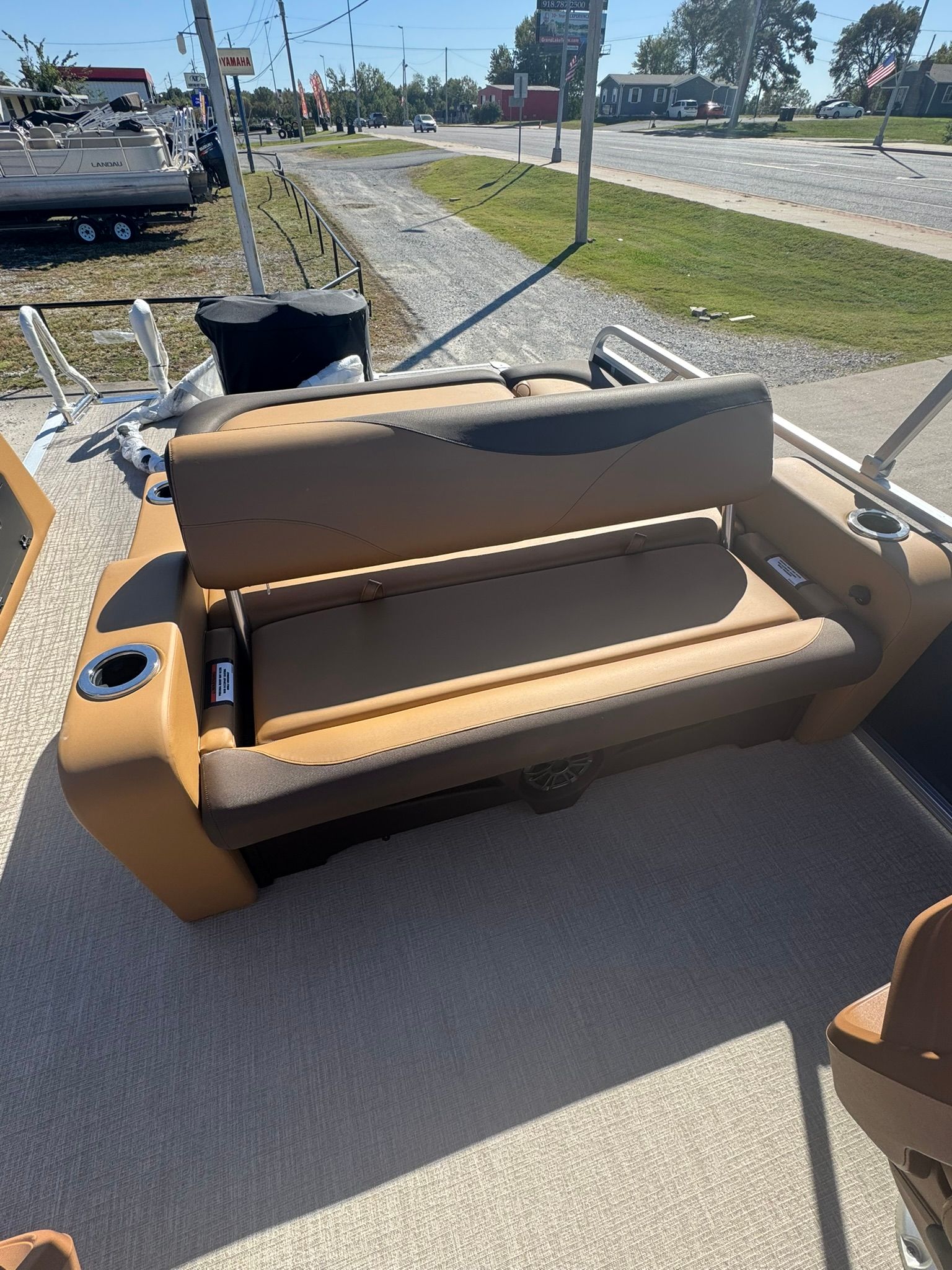 2025 Tahoe 2585 LTZ VRB boat with beige seating area.