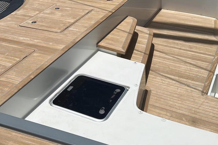 Deck of 2020 Lagoon SEVENTY 7 yacht with wood finish and hatch.