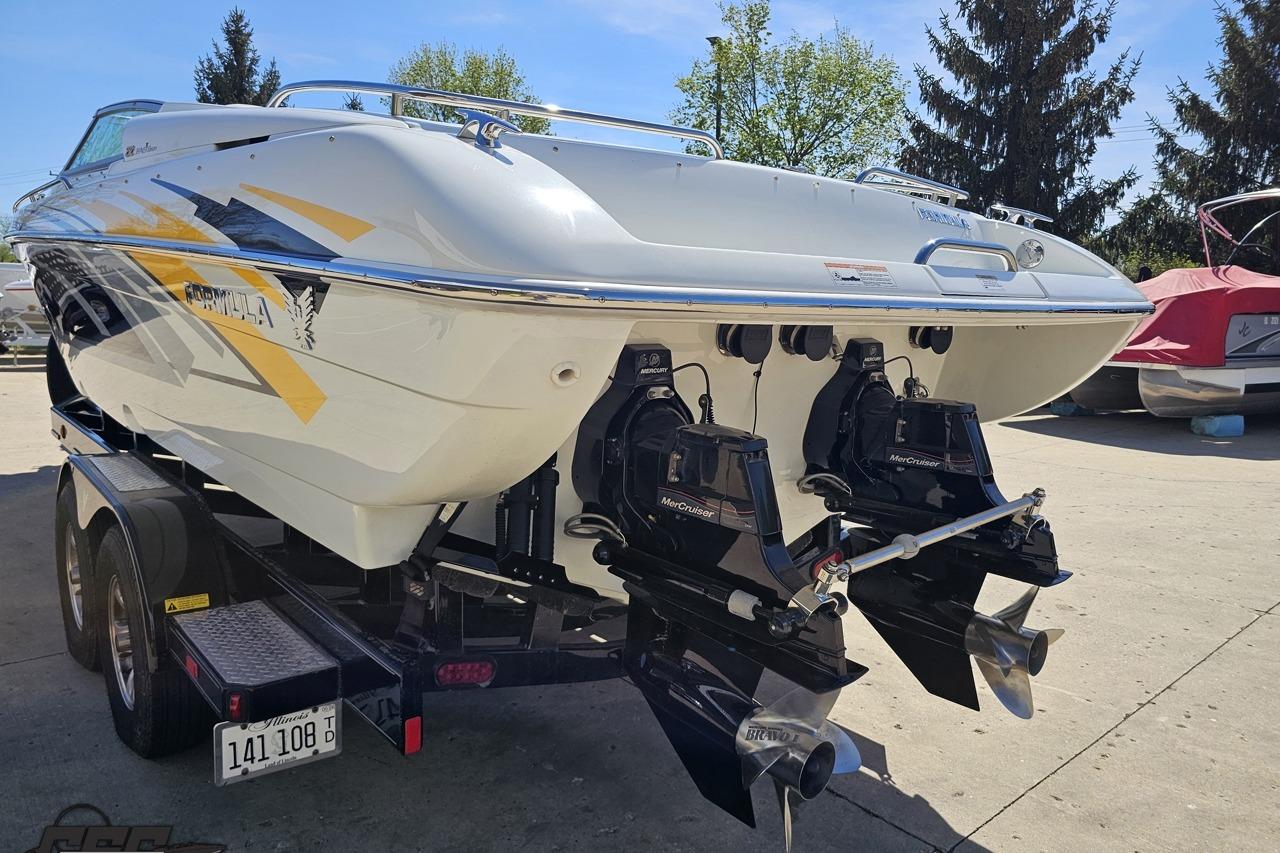 2014 Formula 292 FASTech boat on trailer, featuring dual MerCruiser engines.