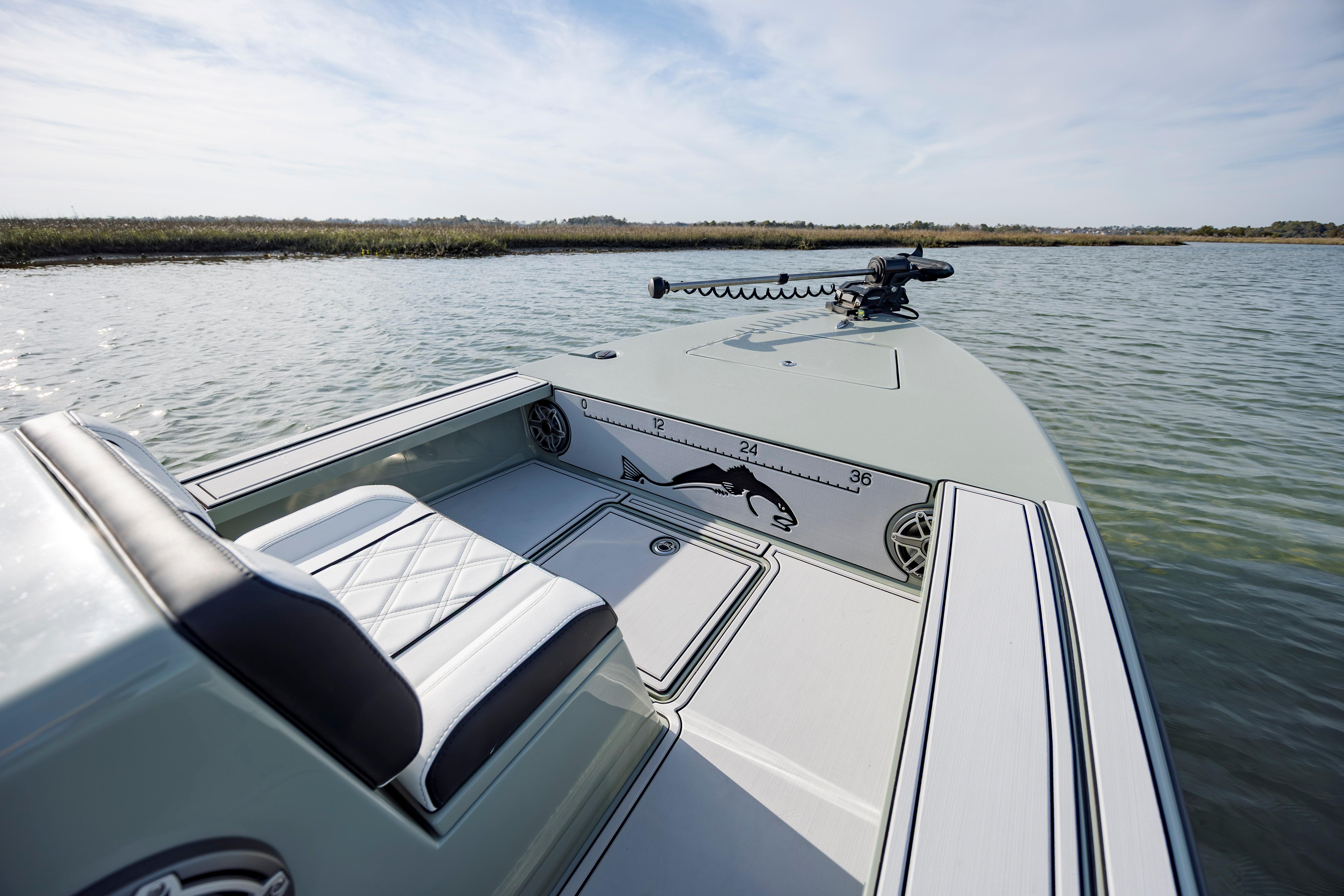 Modern Vtech 18 boat on calm water, featuring sleek design and comfortable seating, 2025 model.