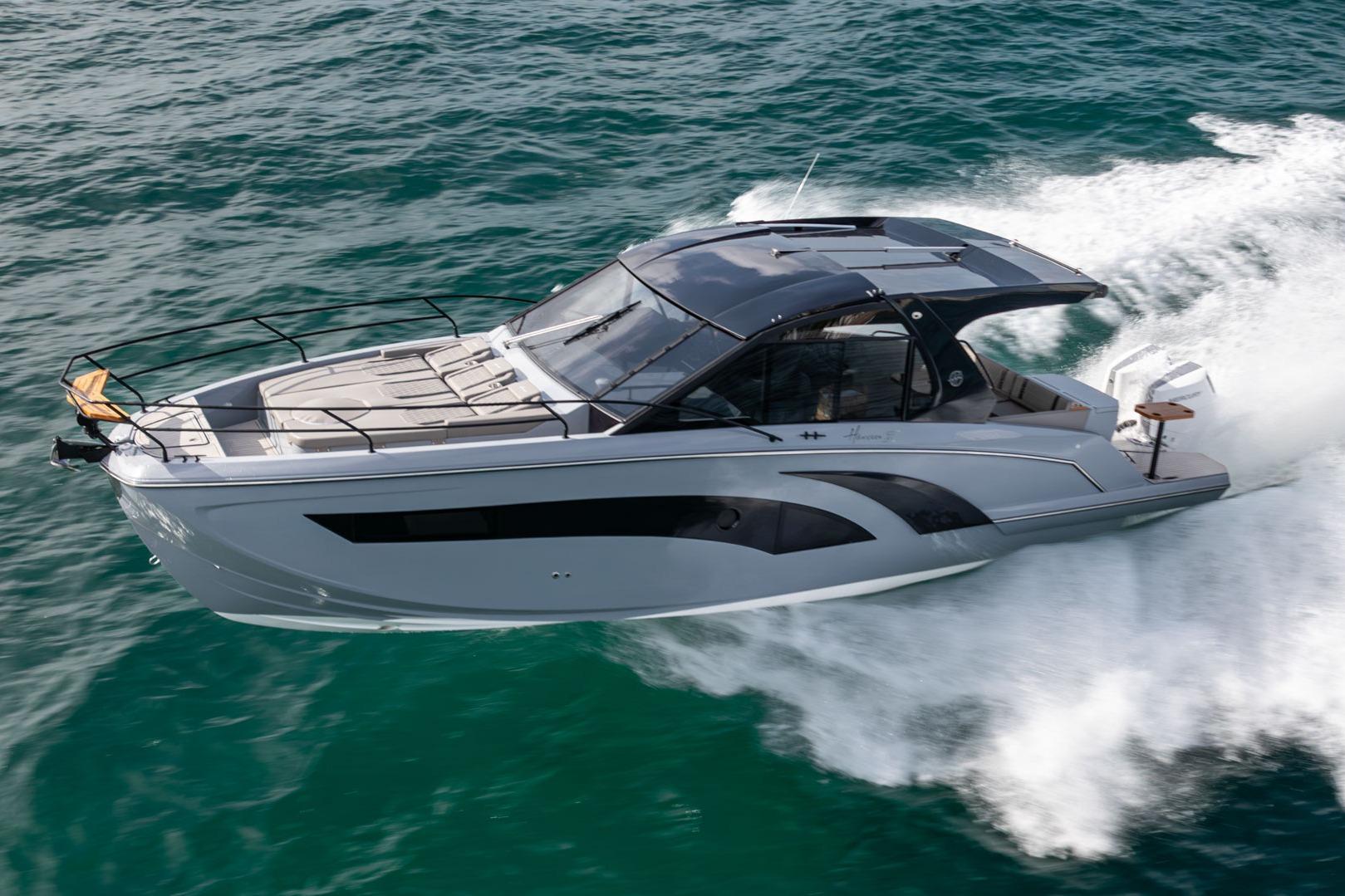 2026 Hanover 387 luxury yacht cruising on open water, showcasing sleek design and performance.