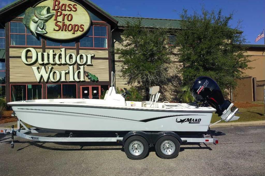 2026 Mako Pro Skiff 19 CC boat displayed outside Bass Pro Shops Outdoor World.
