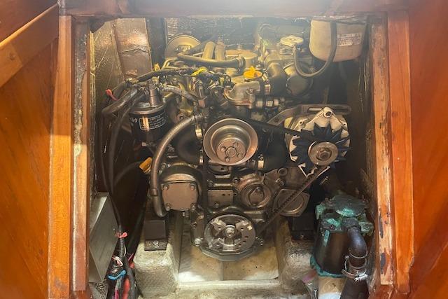 Engine compartment of a 2001 Tartan 3700 sailboat, showcasing mechanical components.