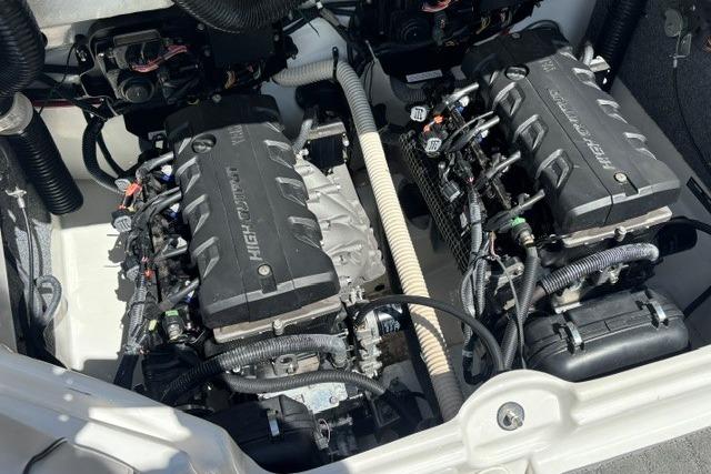 Twin engines of a 2014 Yamaha Boats 212X, showcasing high-performance components.
