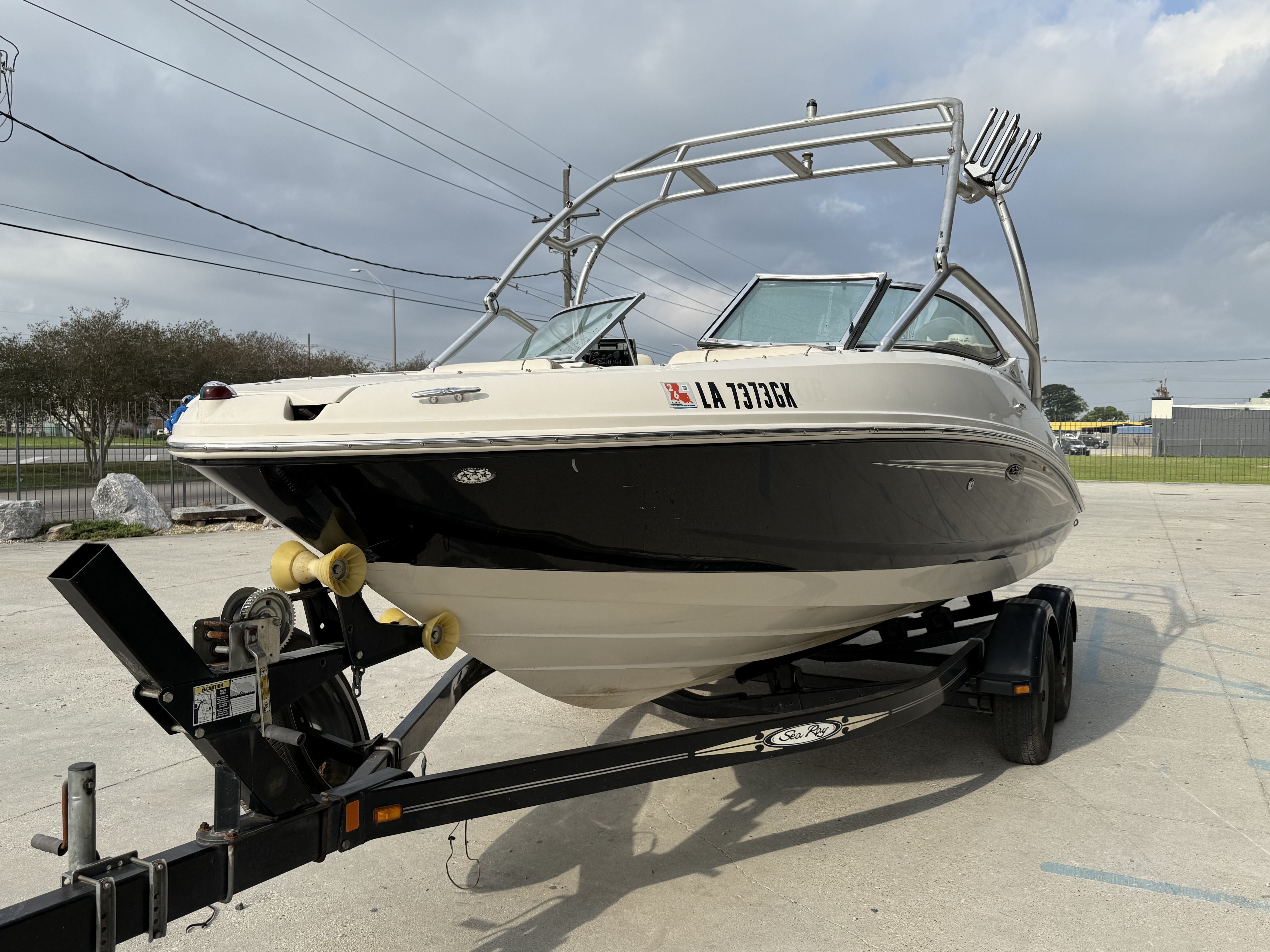 2007 Sea Ray 210 boat on trailer, side view.