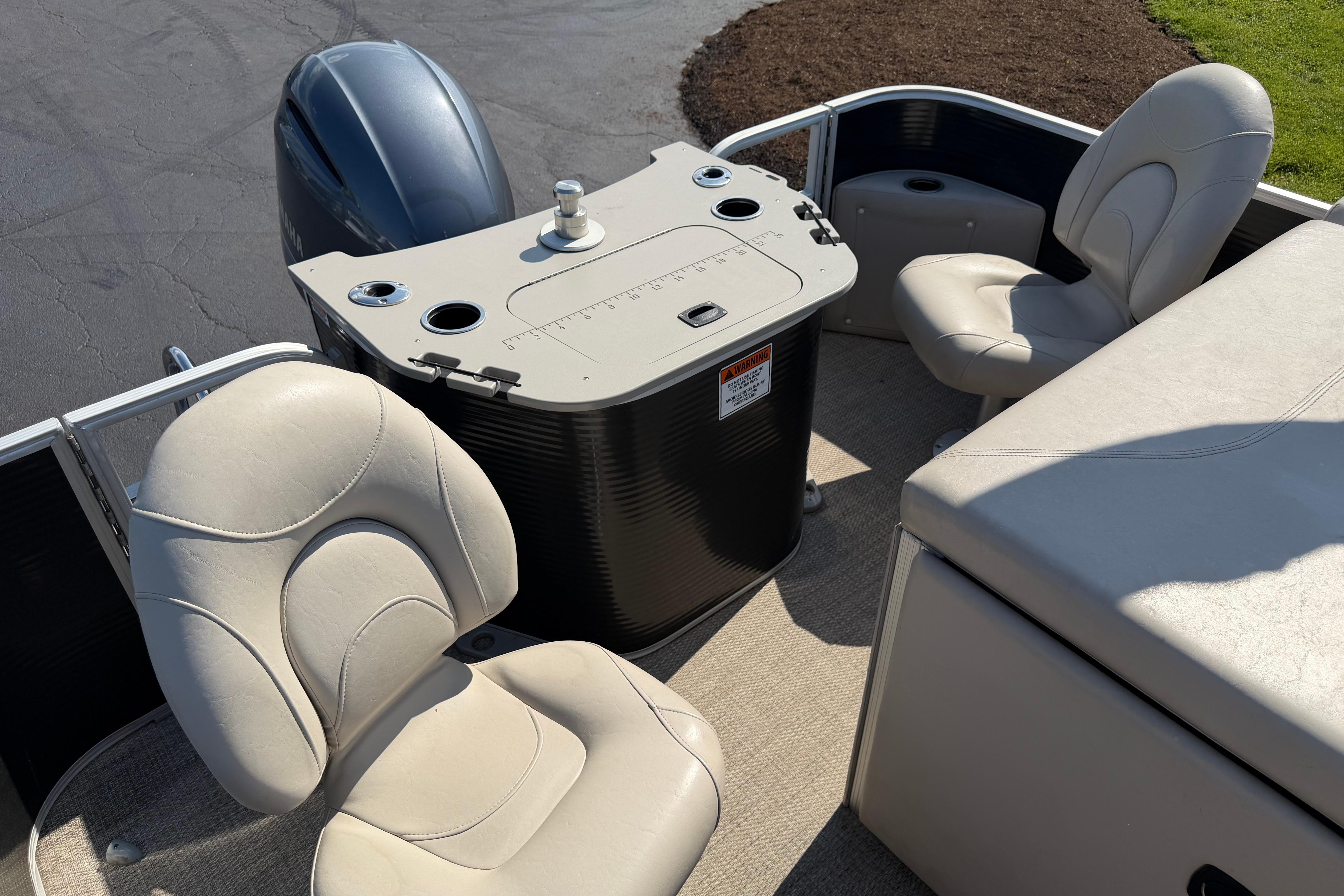2018 Bennington 21 SF boat interior with seating and control panel.