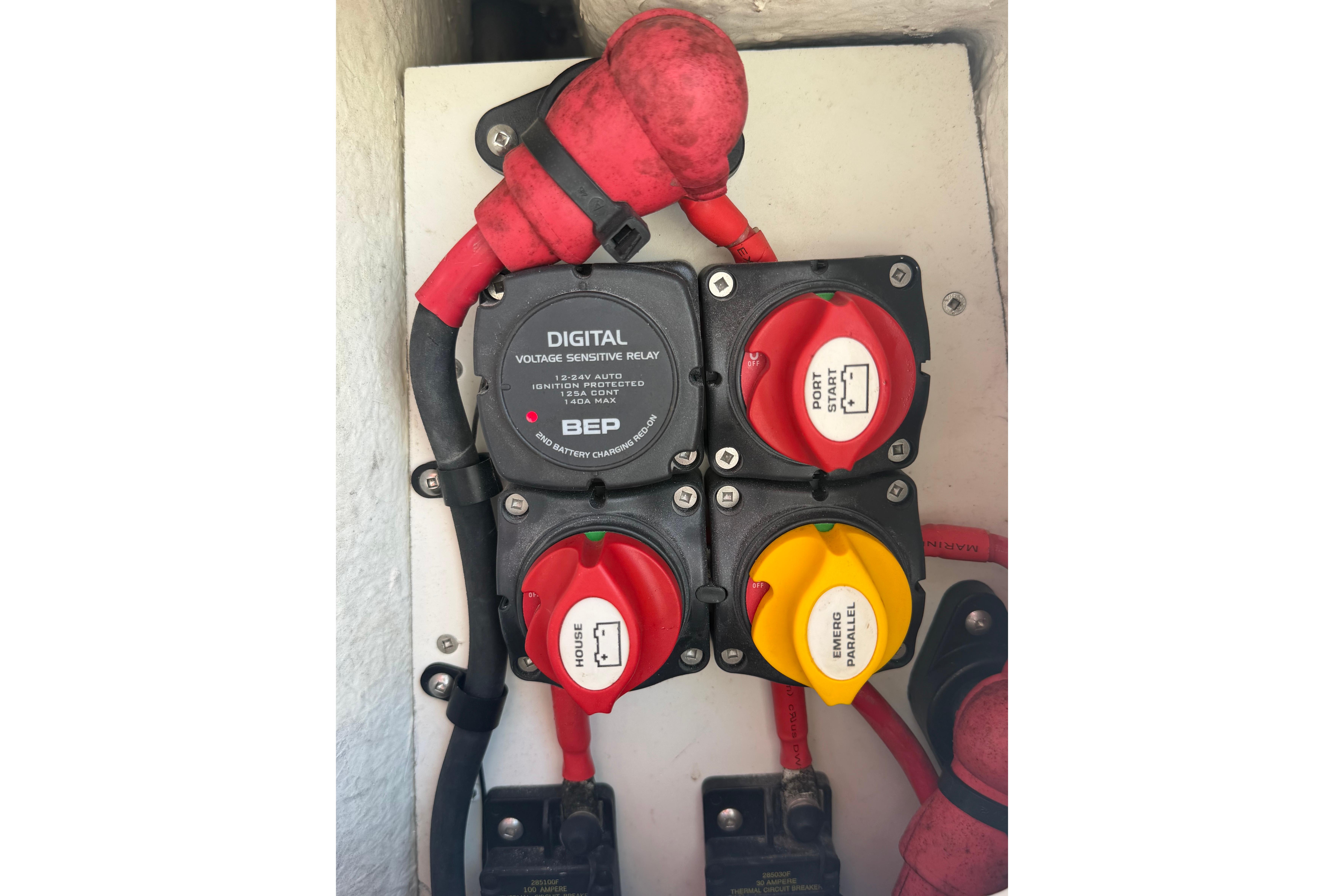 Electrical panel with digital voltage relay and switches on Solara S-250 CW, 2020 model.