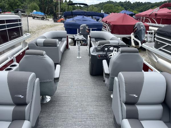 2024 Bennington 22 SVSR-SPS pontoon boat with gray seating and modern interior design.