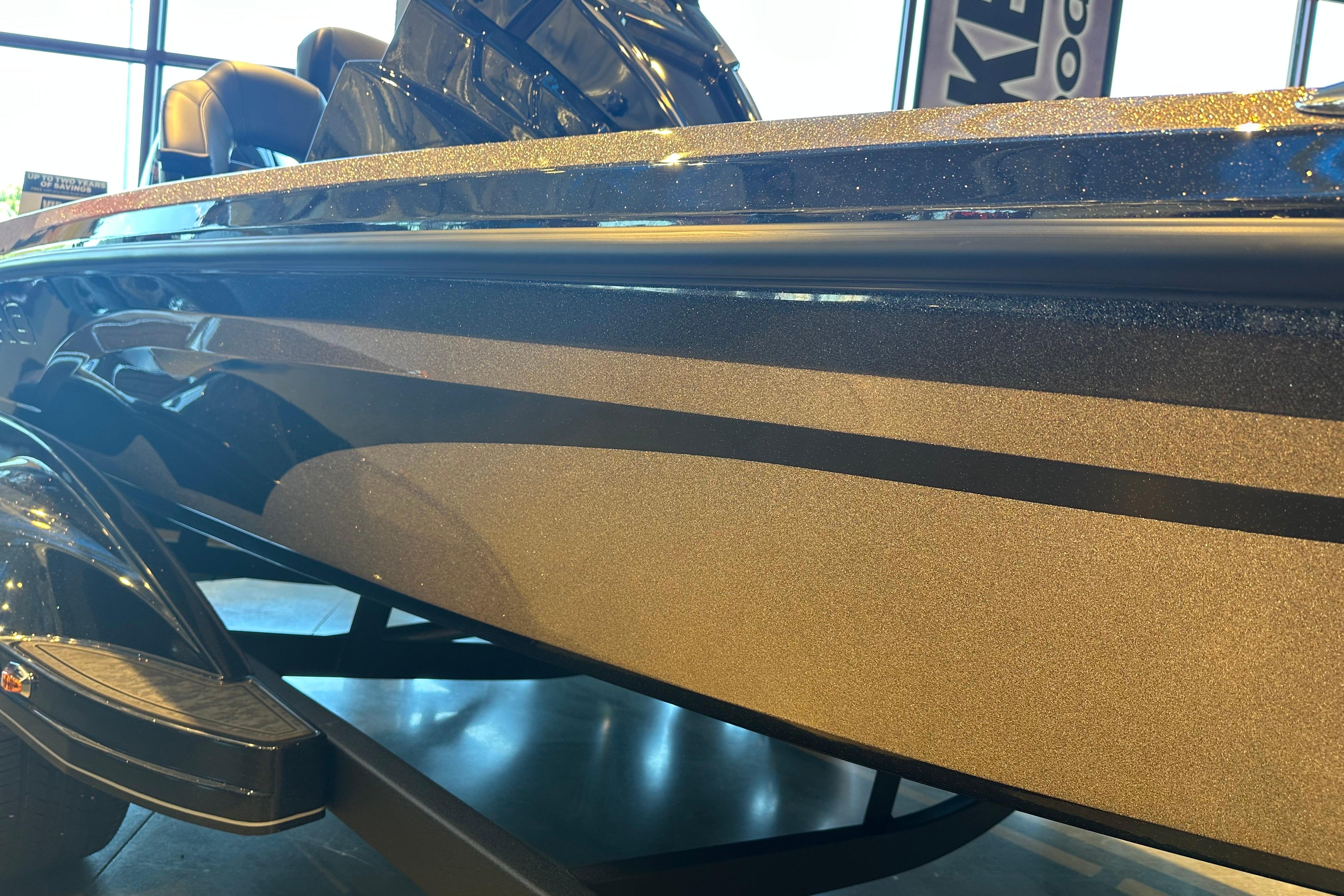 2026 Nitro Z19 XL boat with sleek metallic finish in showroom lighting.