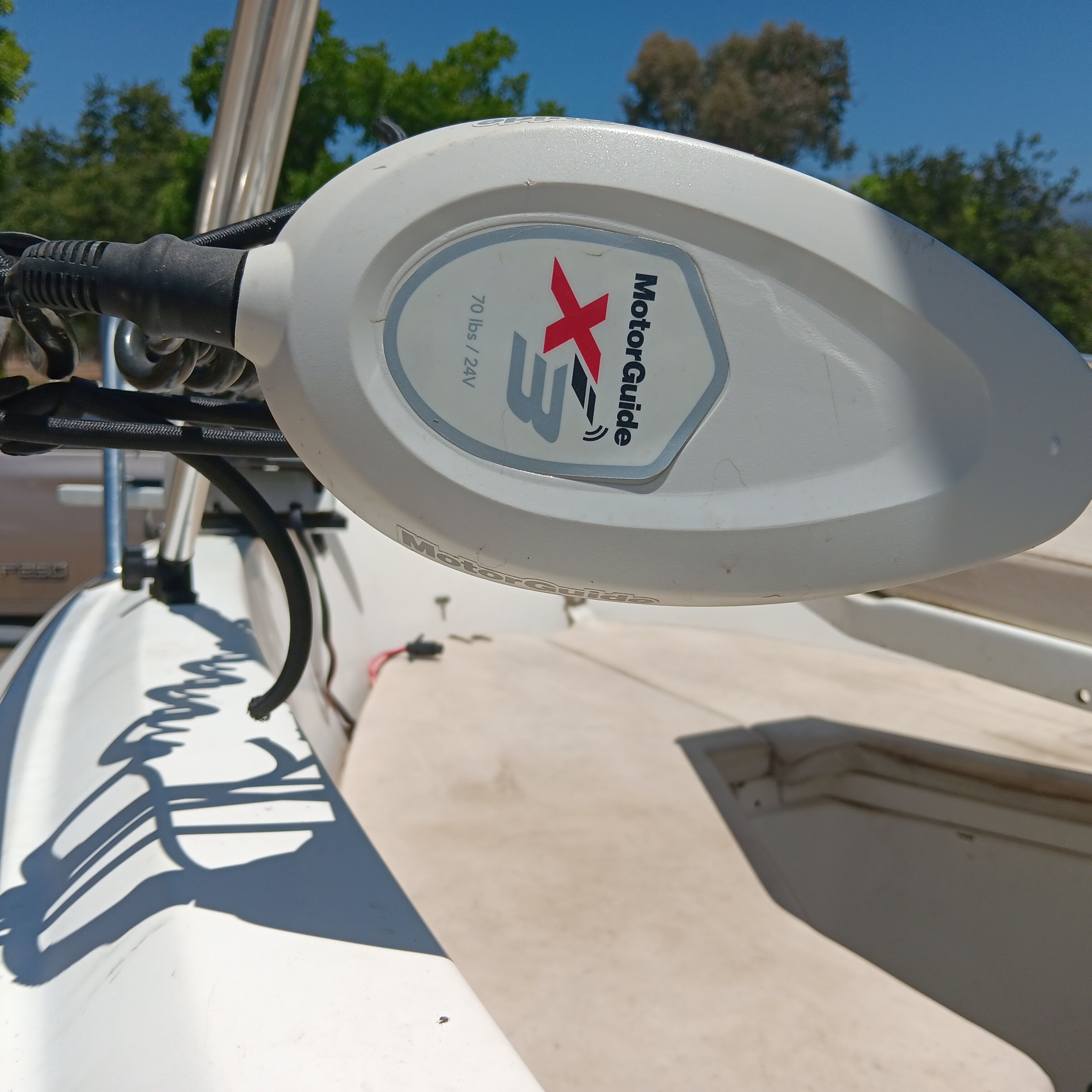 Close-up of a MotorGuide X3 motor on a Doral Ibiza 22 CC boat.