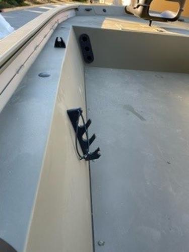2024 Tracker Grizzly 1754 SC boat interior with rod holders and seating area.