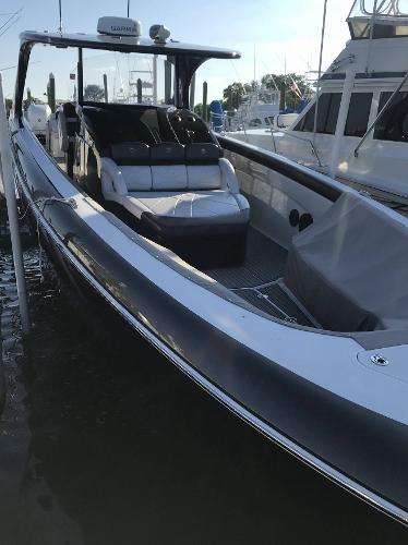 2017 Mystic Powerboats M4200 docked at marina.