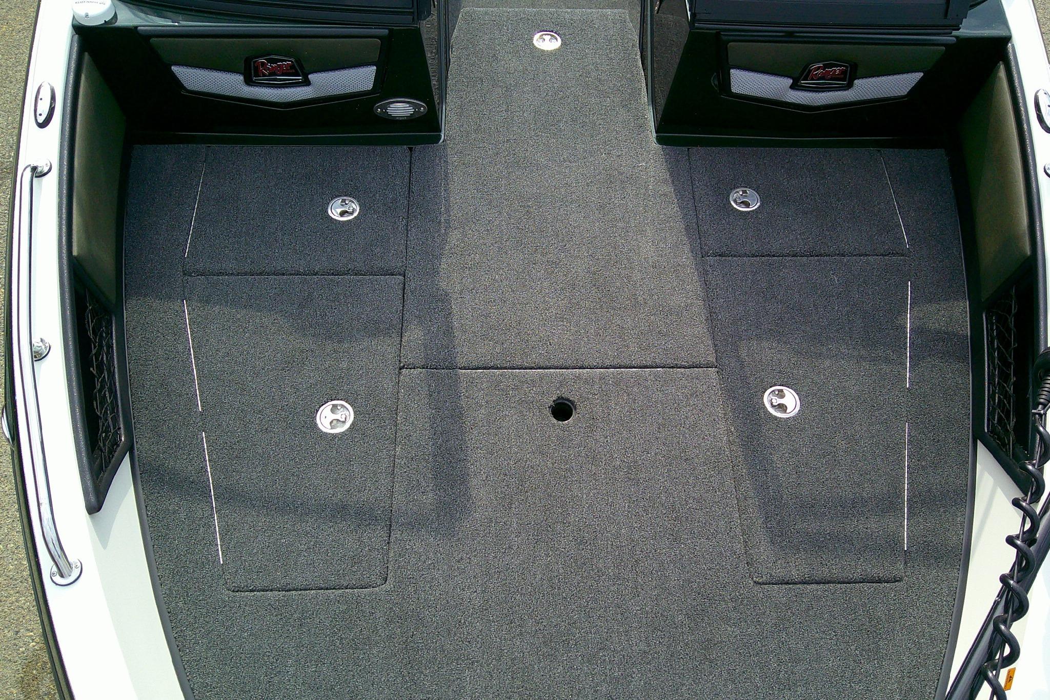 2026 Ranger 1880MS boat deck with gray carpet and storage compartments.