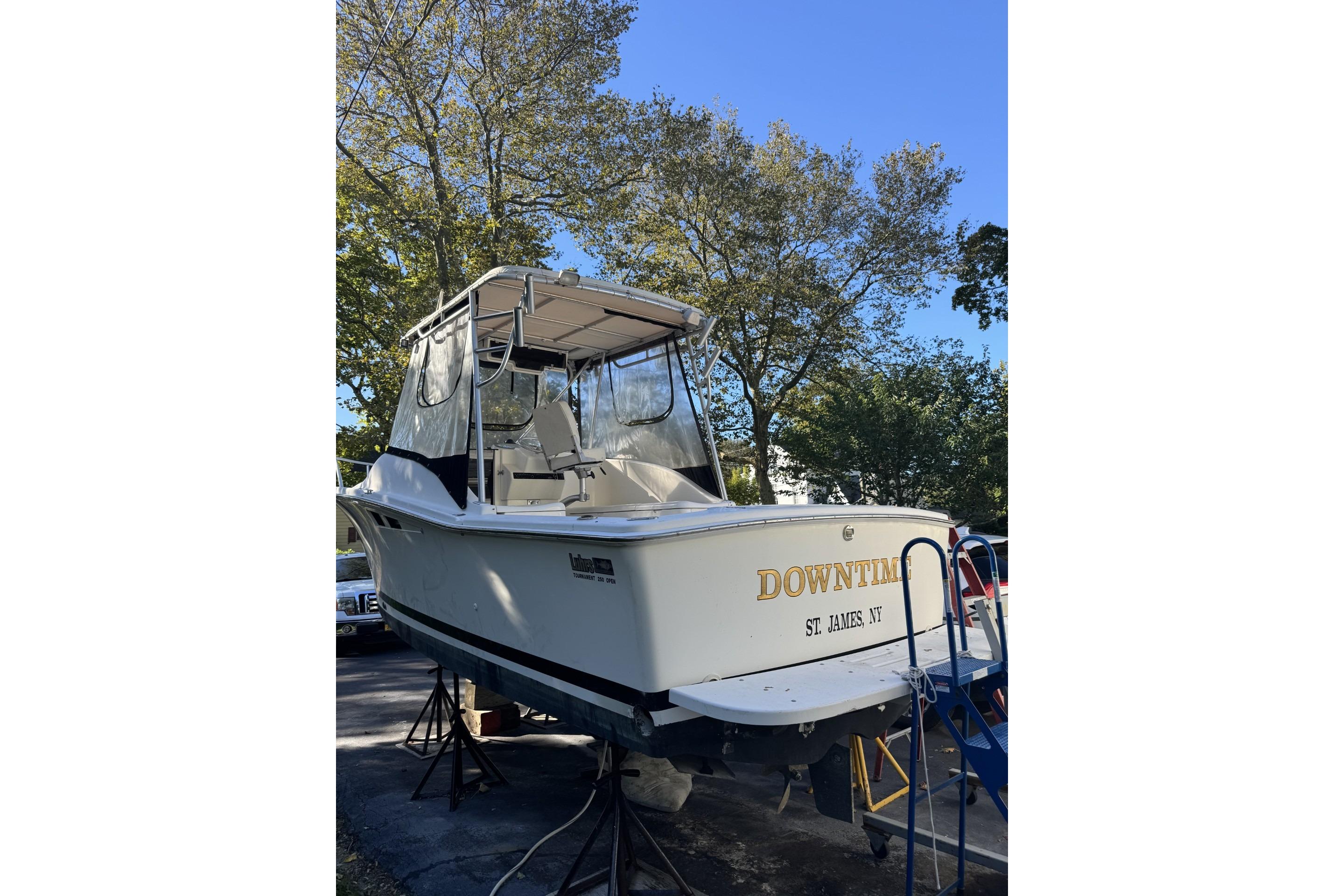 1993 Luhr's Tournament boat named "Downtime" on stands, St. James, NY.