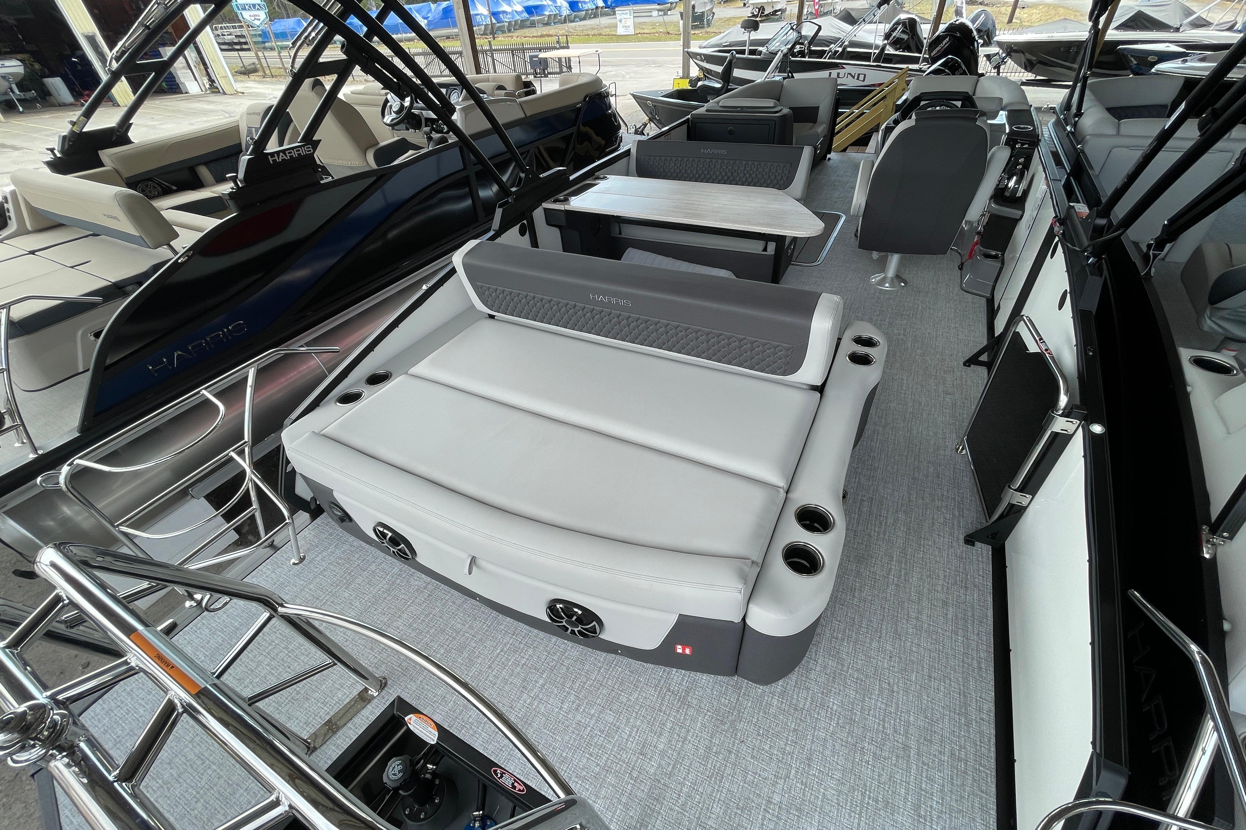 2026 Harris Sunliner 230 pontoon boat interior with gray seating and modern design.