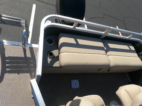2024 Sun Tracker Fishin' Barge 22 XP3 interior seating and cup holders.