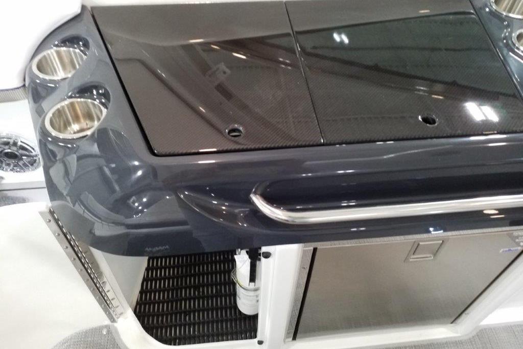 2021 Formula 350 Sun Sport boat interior with sleek countertop and cup holders.