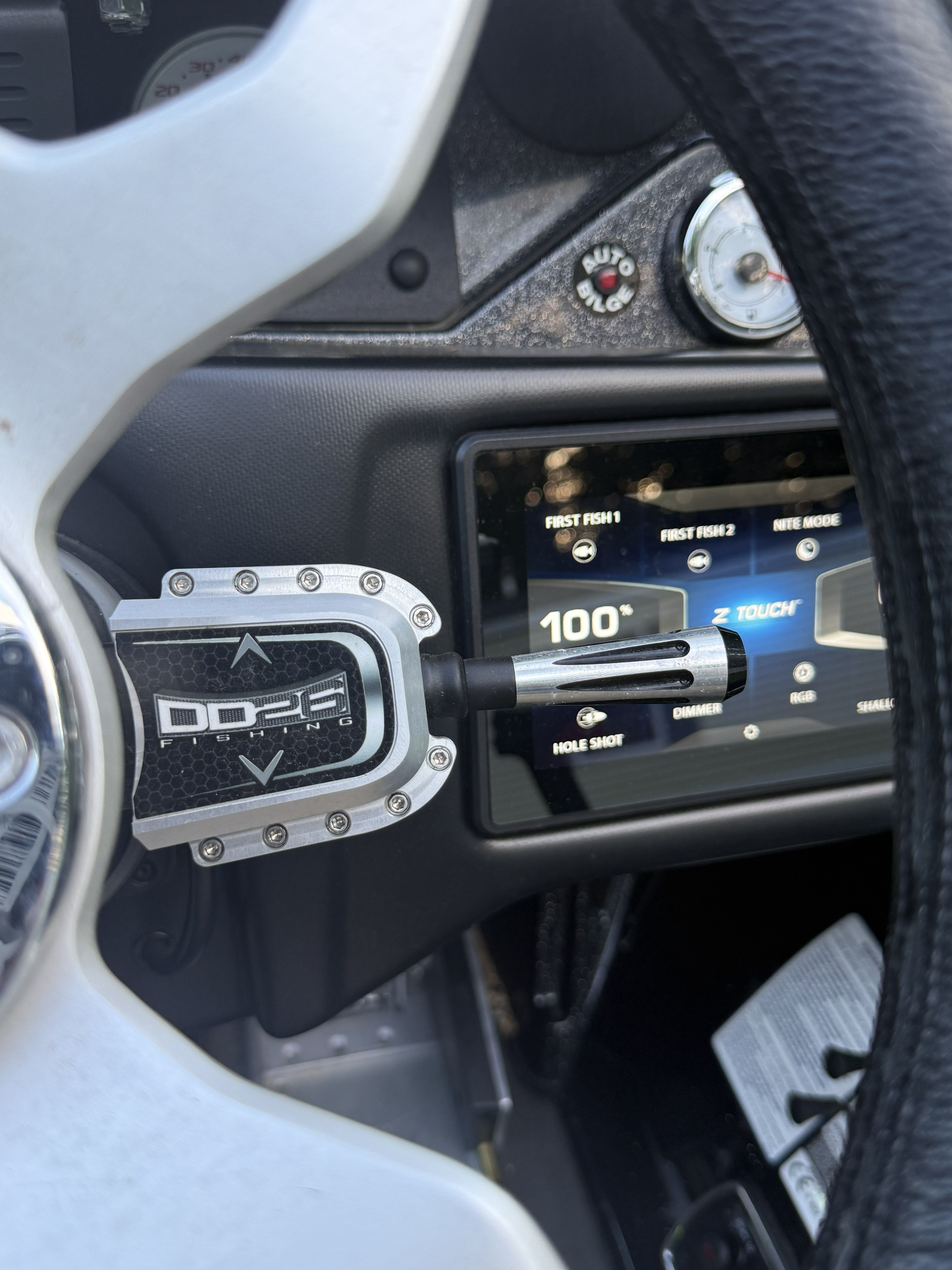Close-up of the steering area of a Nitro Z21 XL Pro boat with modern instruments.