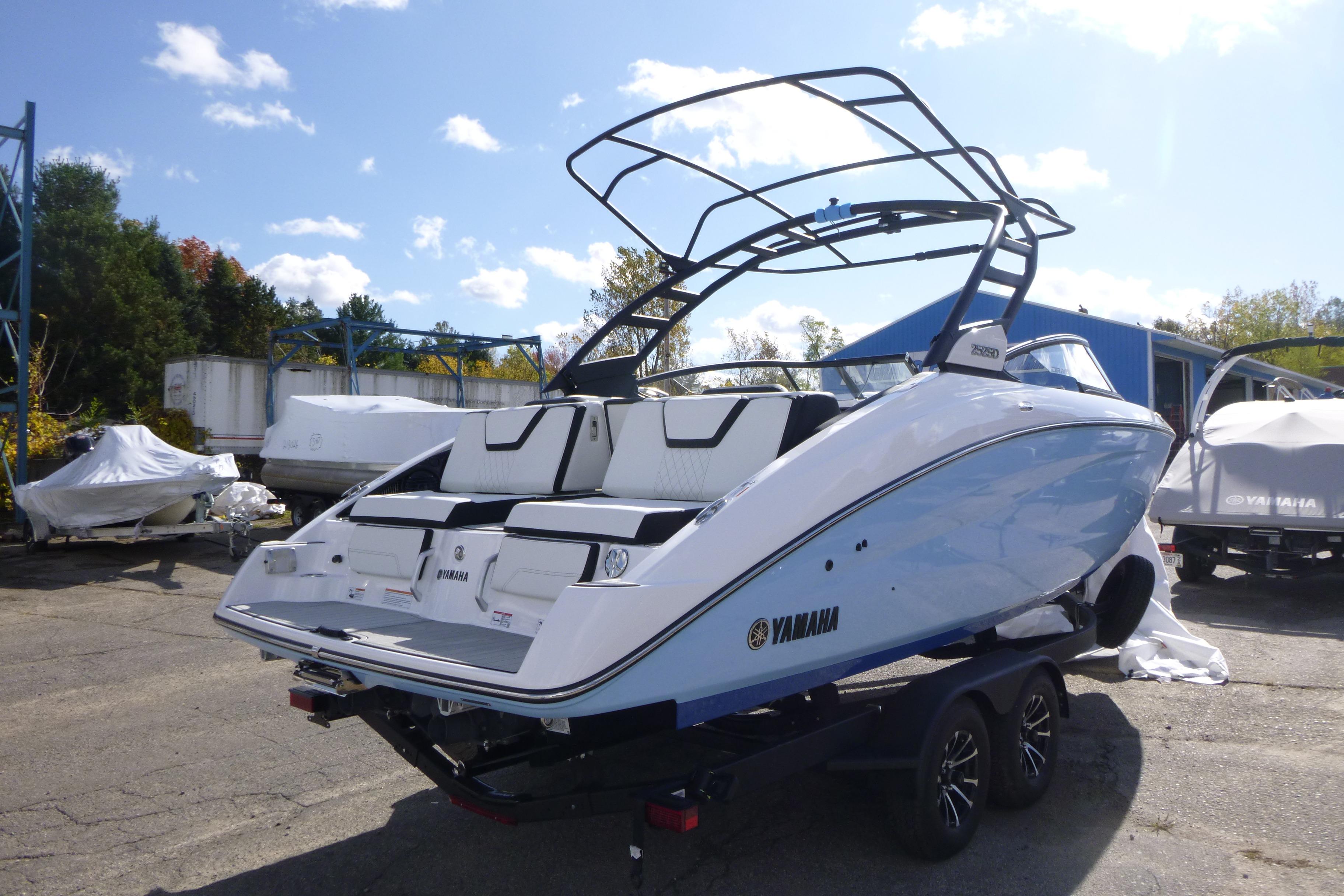2026 Yamaha Boats 252SD on trailer, sleek design, outdoor setting, clear sky.