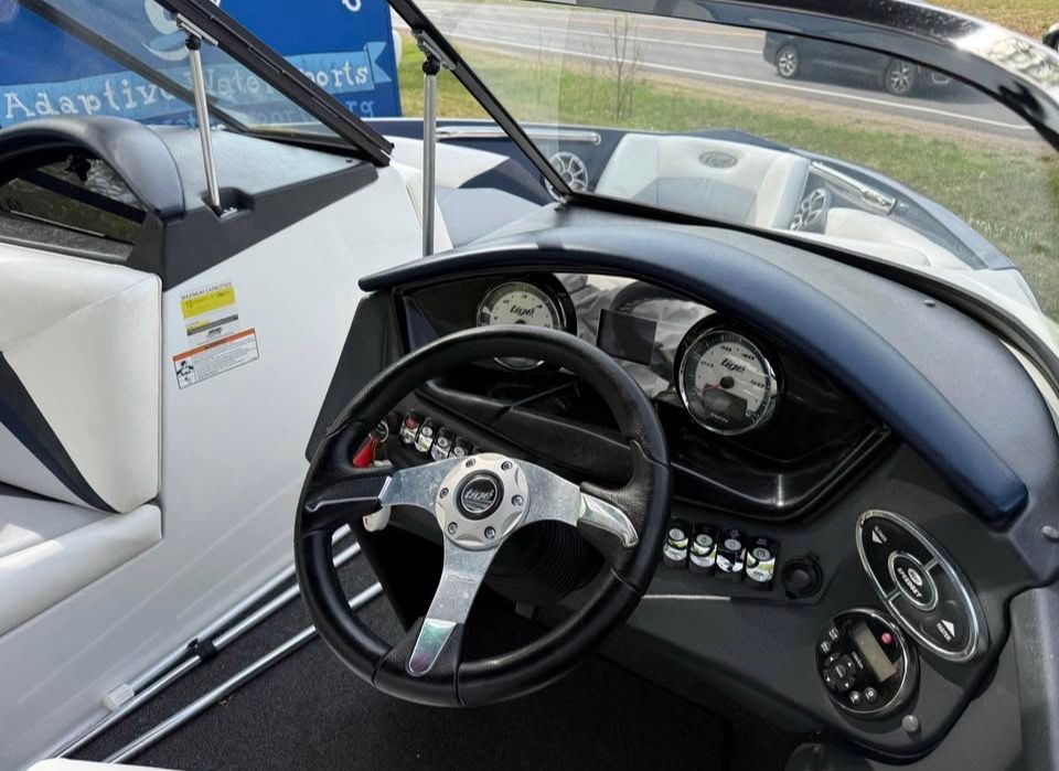 Interior view of a 2010 Tigé Z1 boat dashboard.