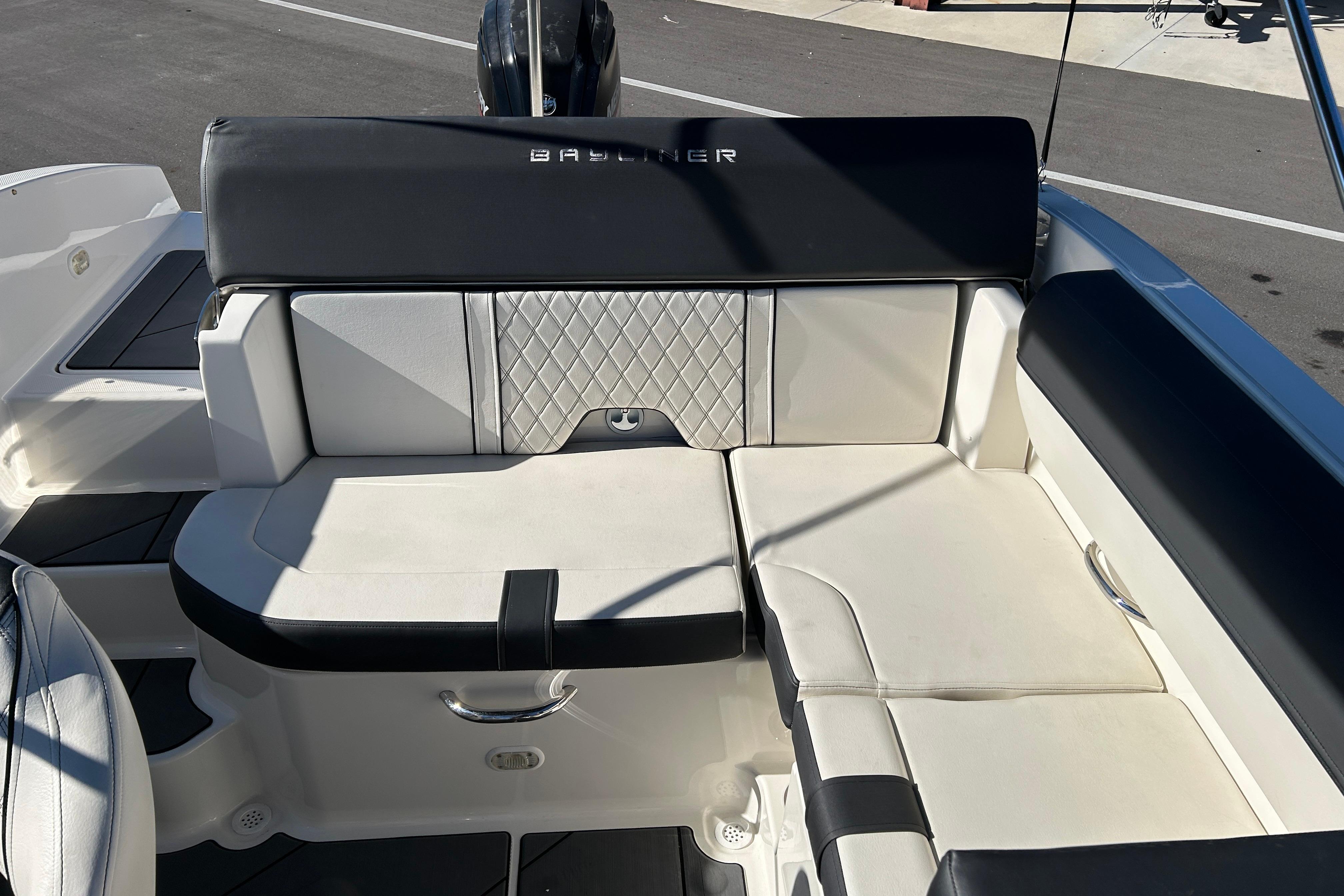 2020 Bayliner DX 2000 boat interior with white and black seating.