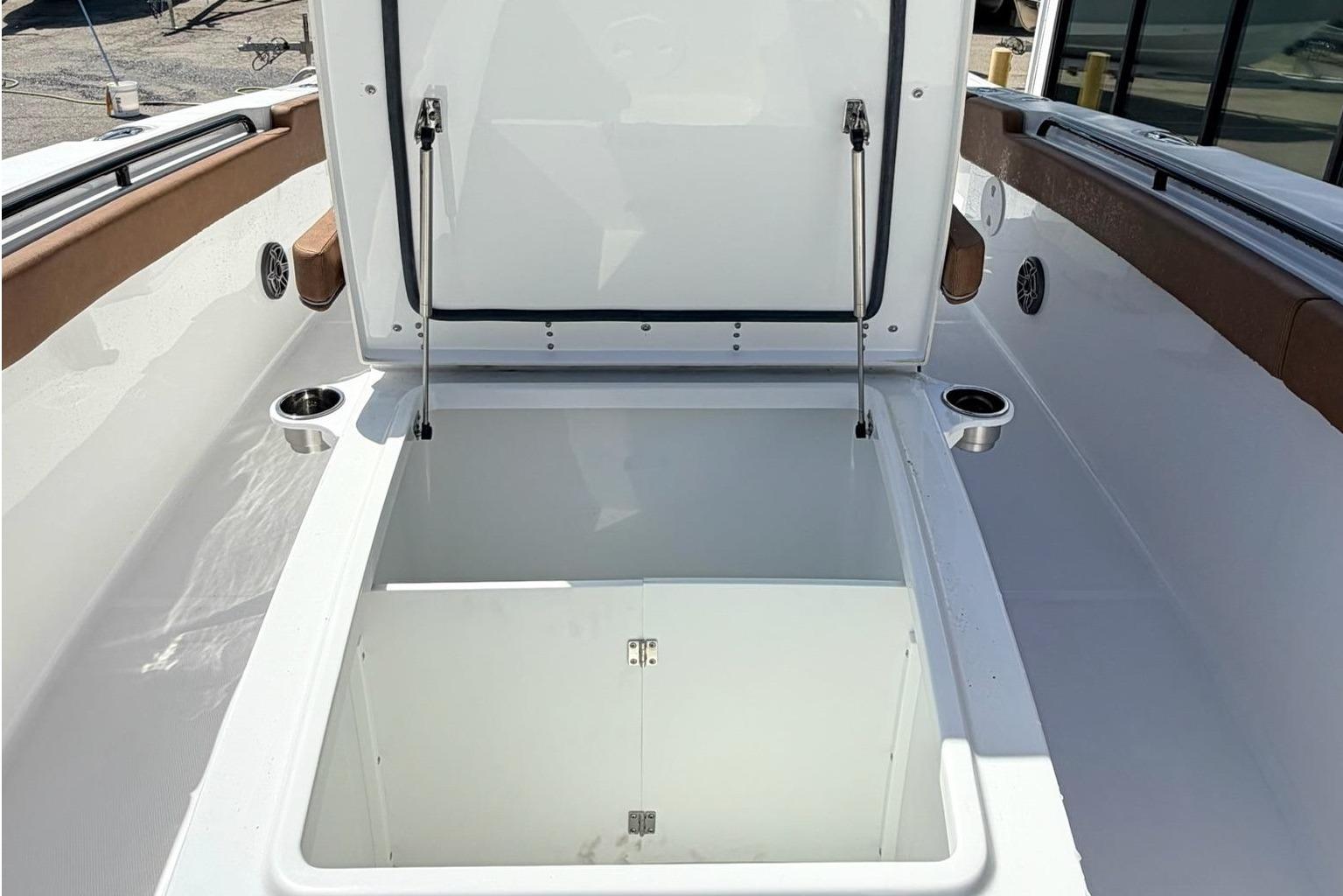 2026 Sea Hunt Ultra 305 Coffin Box with open storage compartment.
