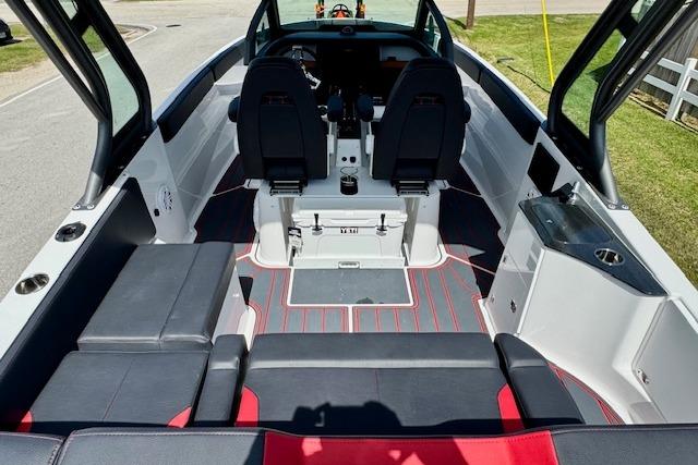 2026 Monterey Elite 25 OB boat interior with sleek seating and modern design.