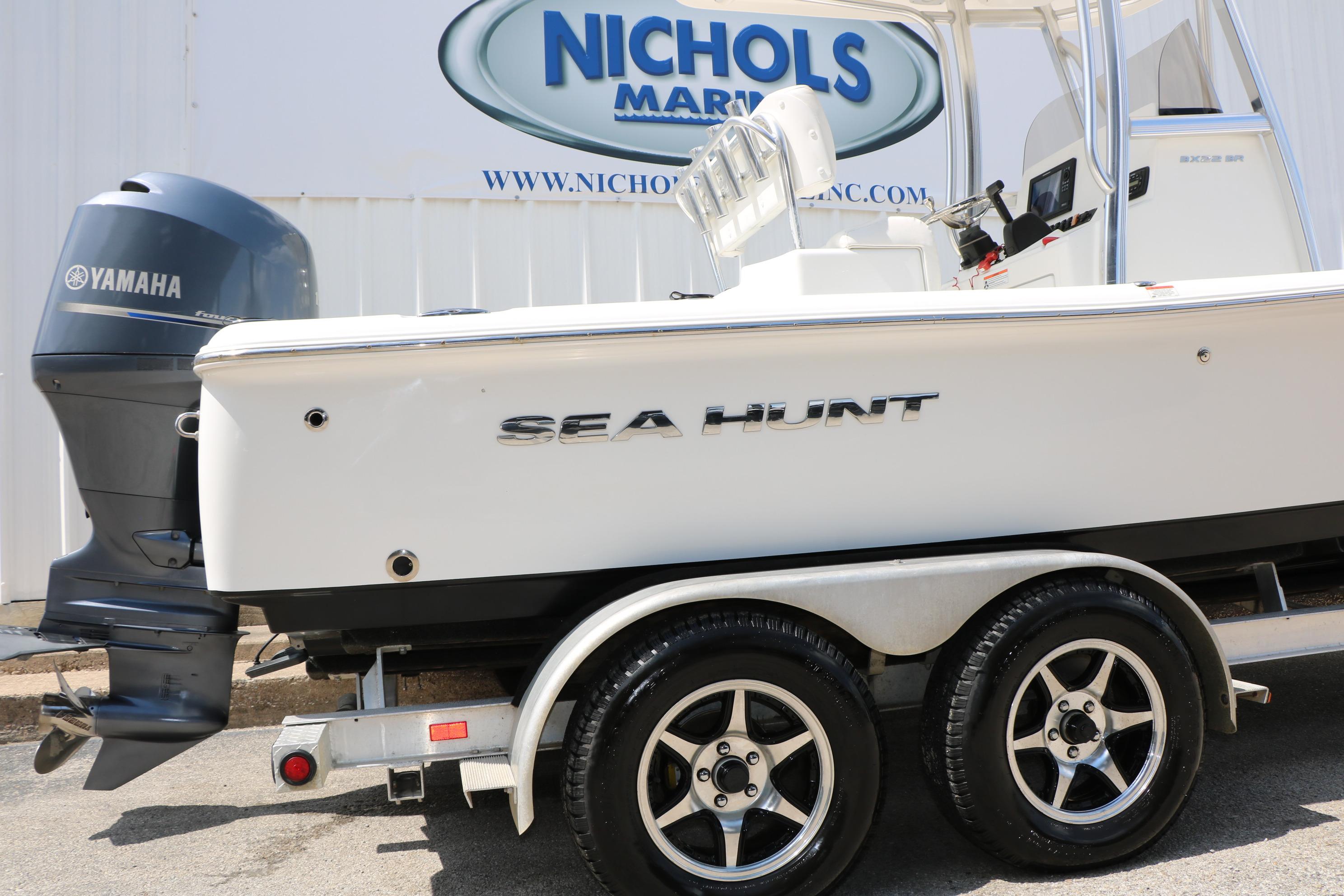 2015 Sea Hunt BX 22 BR boat on trailer with Yamaha outboard motor.