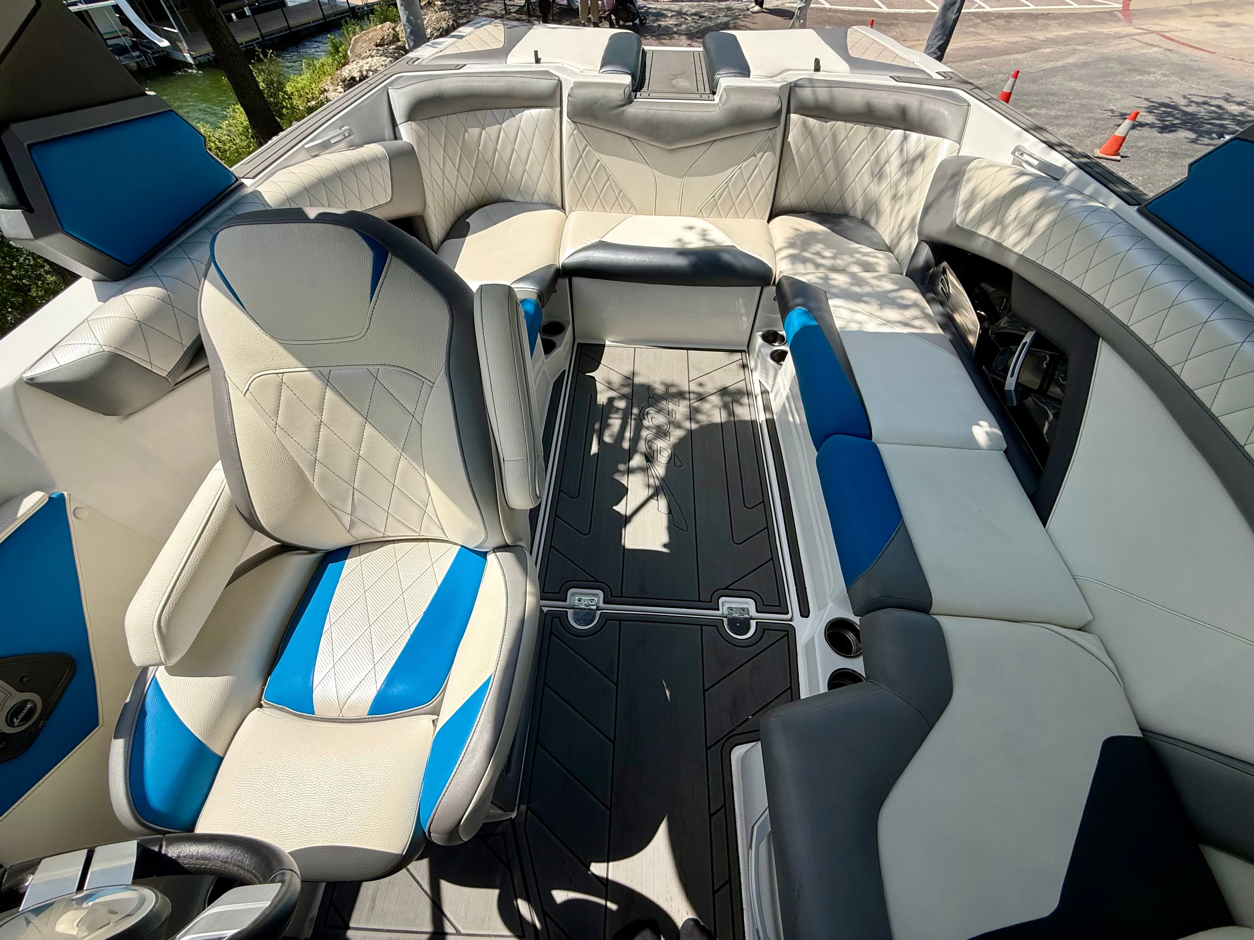 Interior view of a 2017 Tigé Z3 boat with blue and white seating.