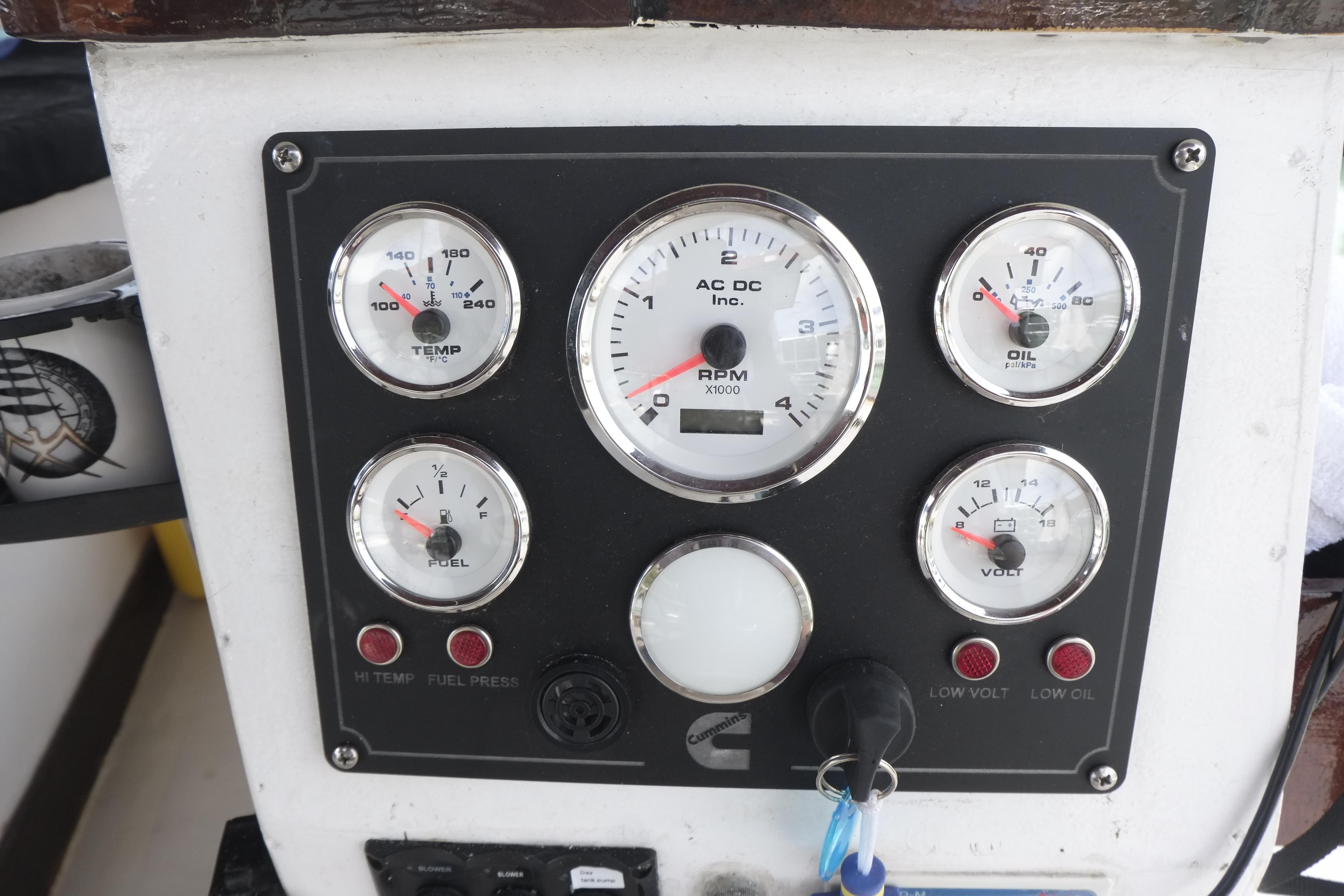 Instrument panel of a 2006 Custom Bud Macintosh schooner with gauges and controls.