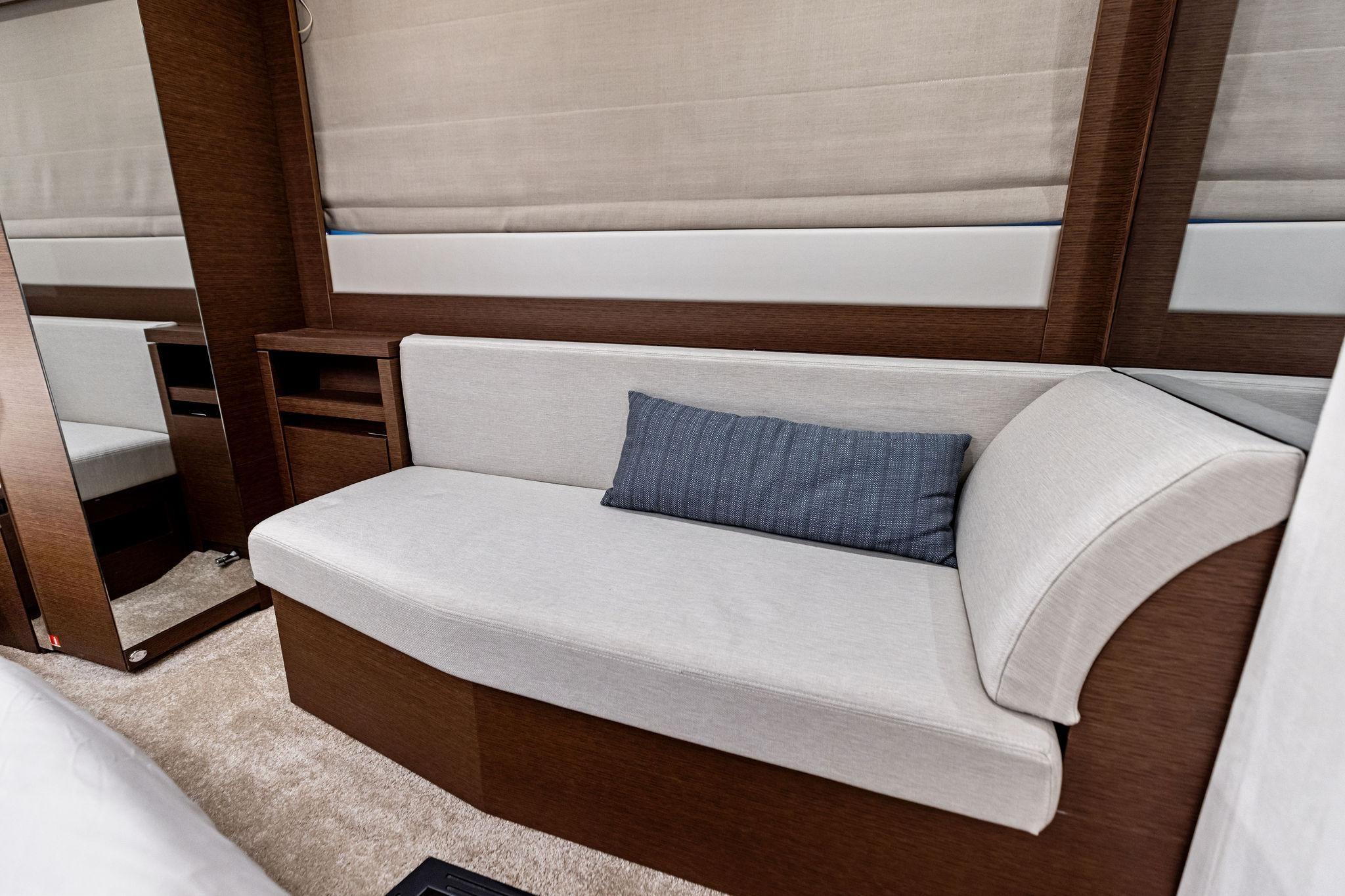Luxurious interior of 2019 Prestige 520 yacht with elegant seating and modern design.