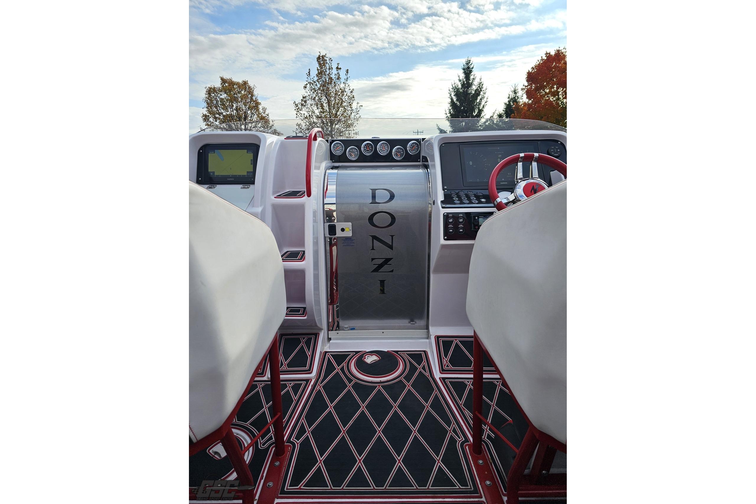 2008 Donzi 38 ZR boat cockpit with modern controls and stylish seating.