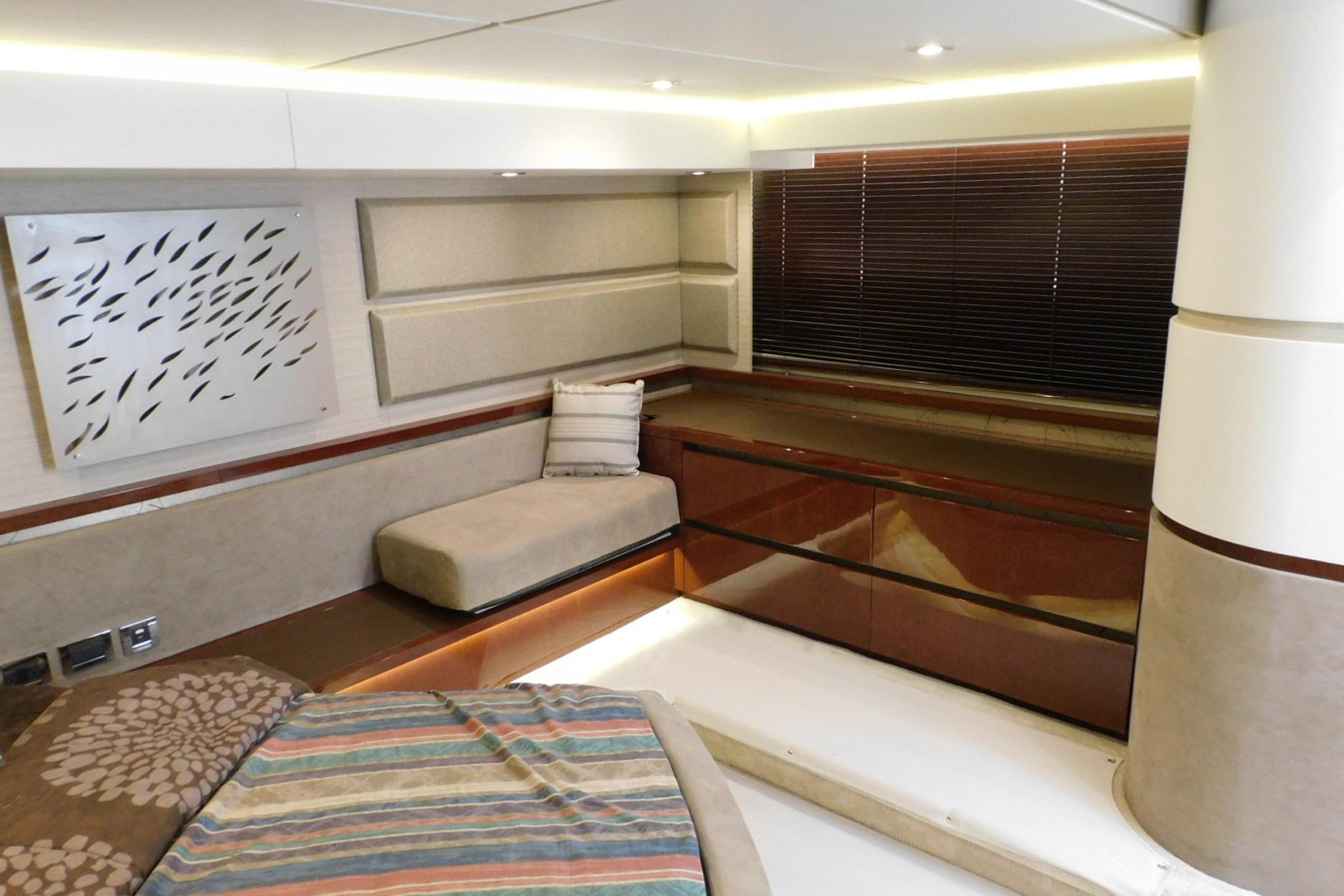 Luxurious interior of 2019 Sea Ray L550 yacht with modern decor and comfortable seating.