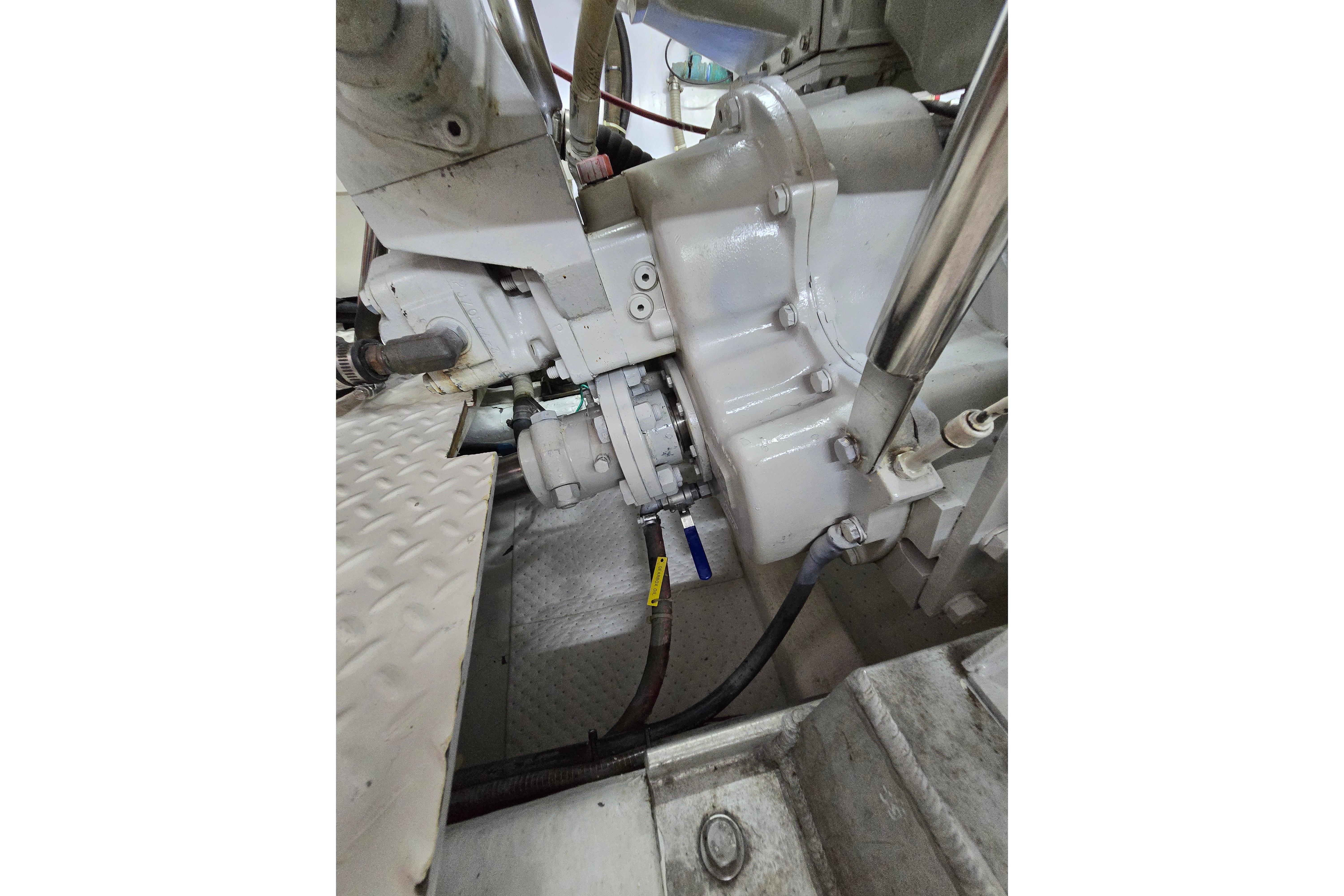 Engine compartment of a 2004 Grand Harbour 58 yacht, showcasing mechanical components.