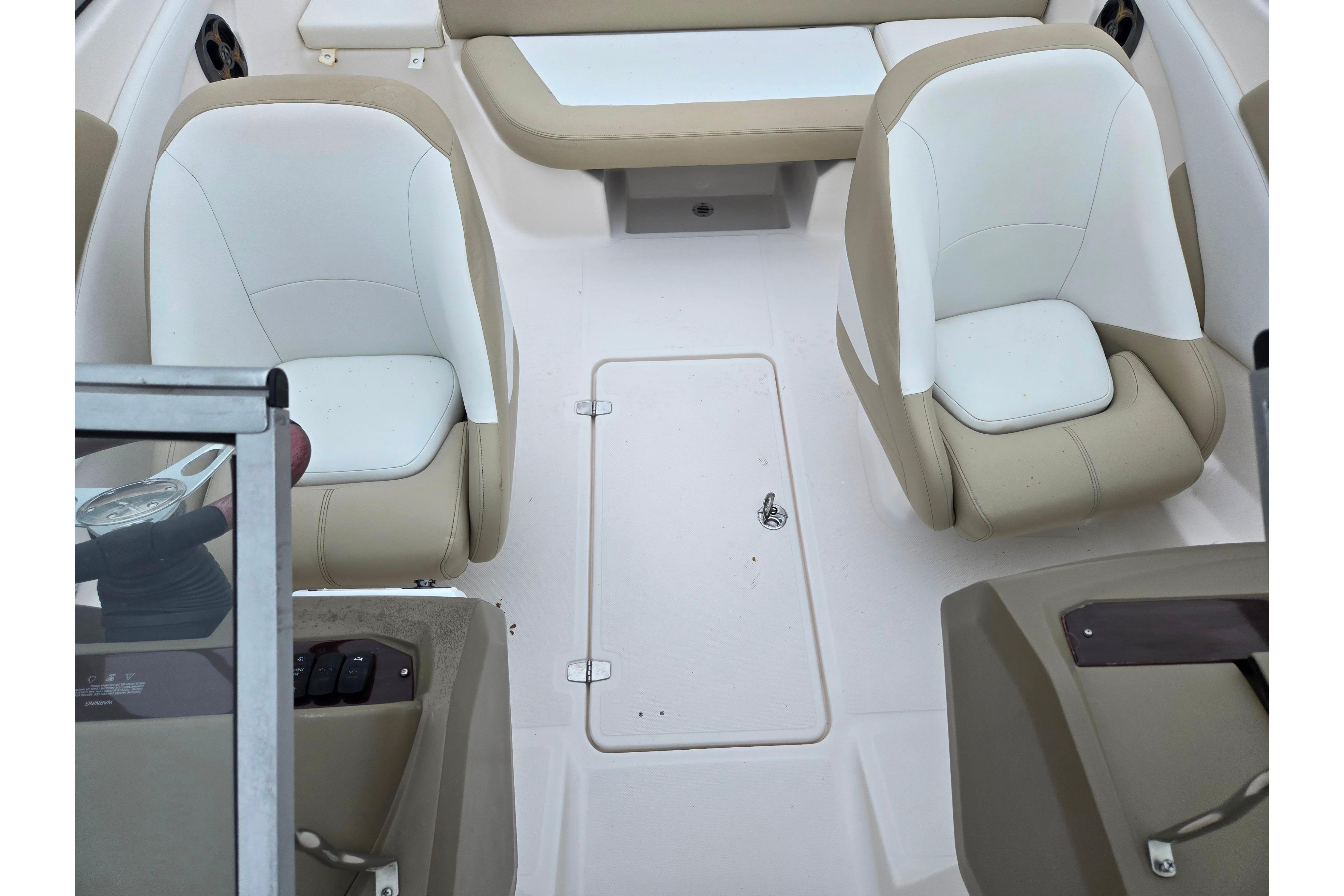 2015 Regal 1900 ES Bowrider interior with beige and white seating arrangement.