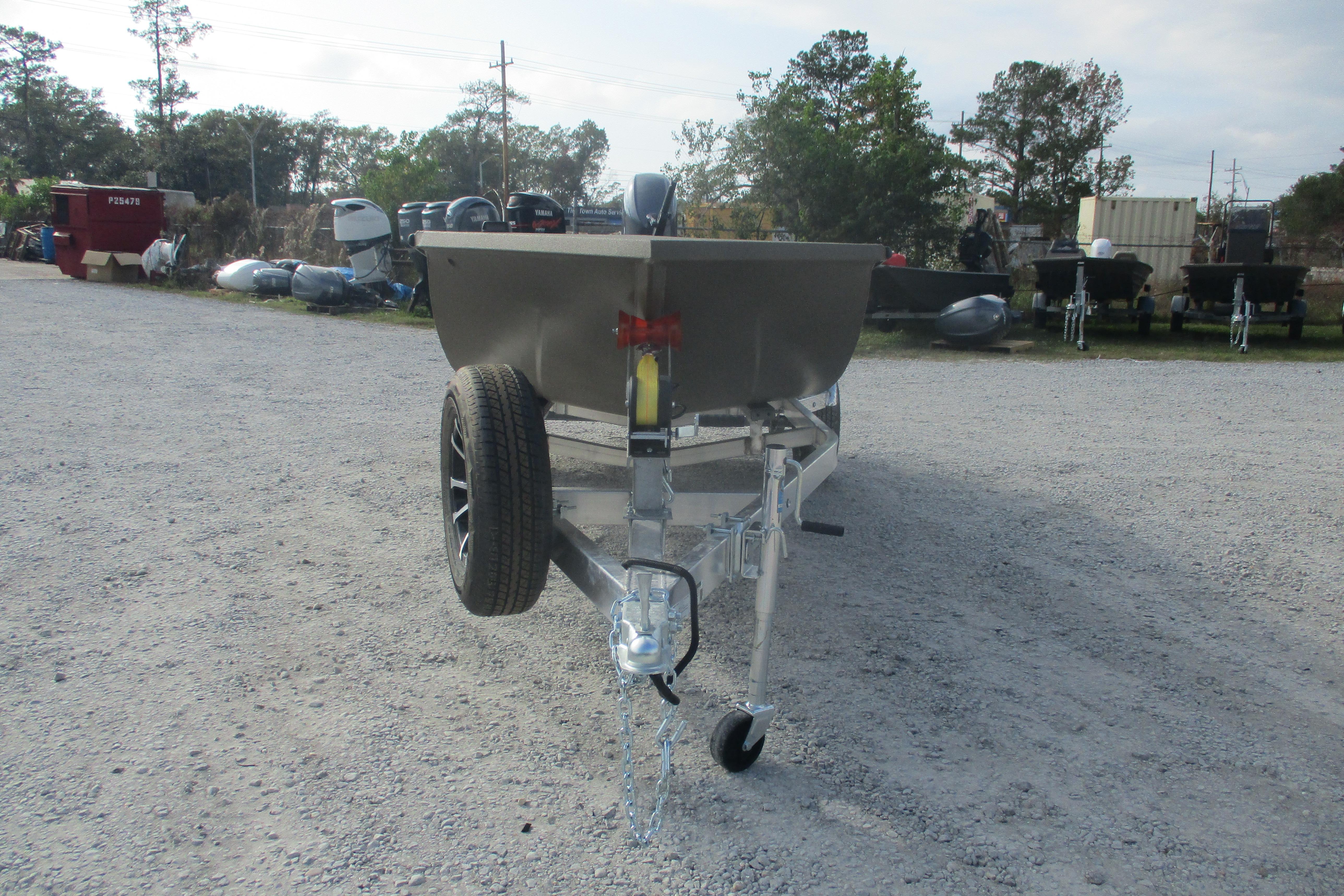 2026 Avid 16 Commander boat on trailer in outdoor setting.