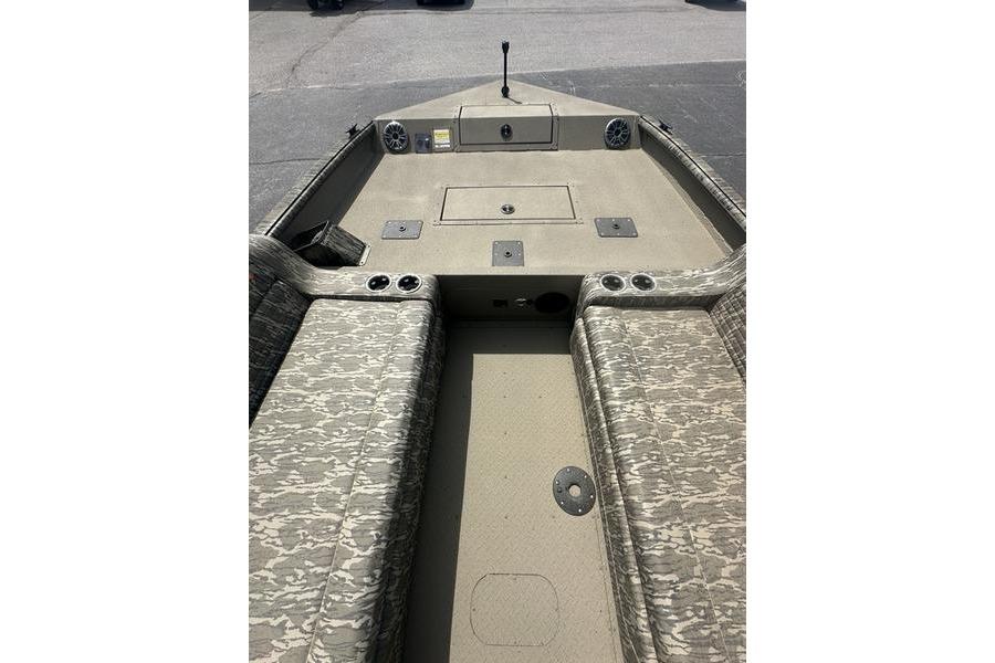 2026 SeaArk EasyCat boat interior with camouflage seating and storage compartments.
