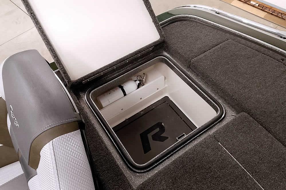2026 Ranger Z519R Cup-Equipped boat storage compartment with open lid, showcasing interior features.