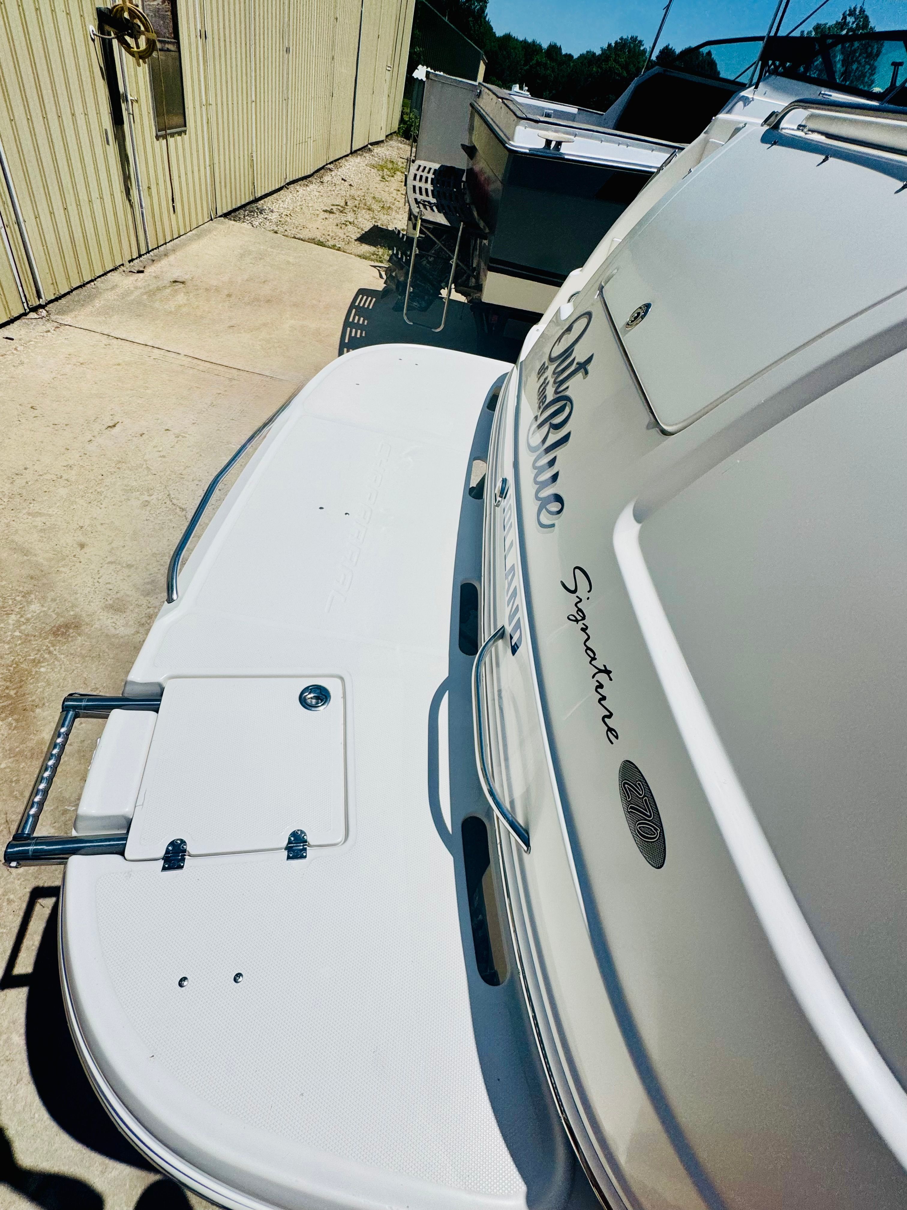 2005 Chaparral Signature 270 boat at dock.
