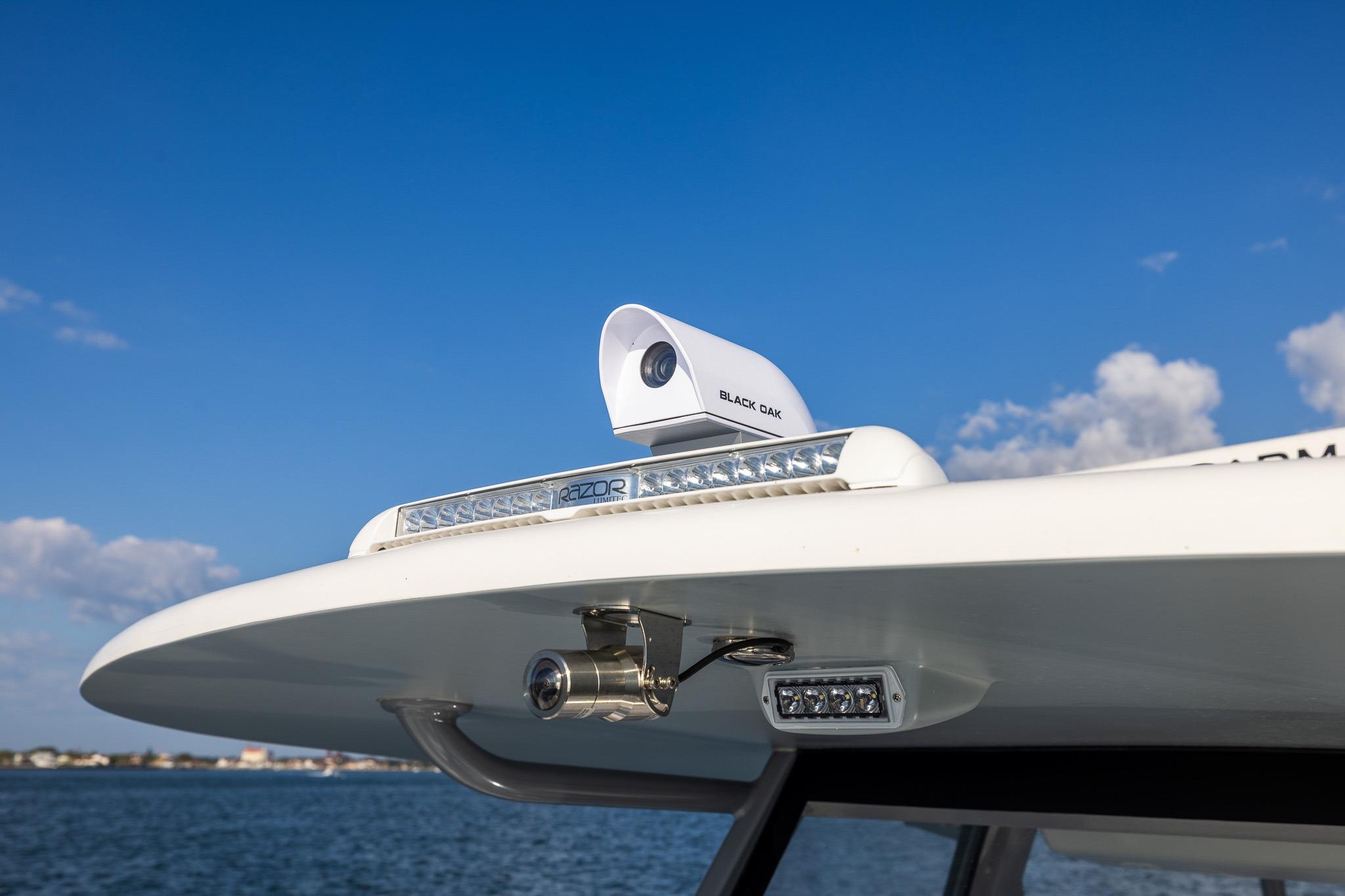 2026 Front Runner 37 Catamaran with advanced lighting and camera system on deck.